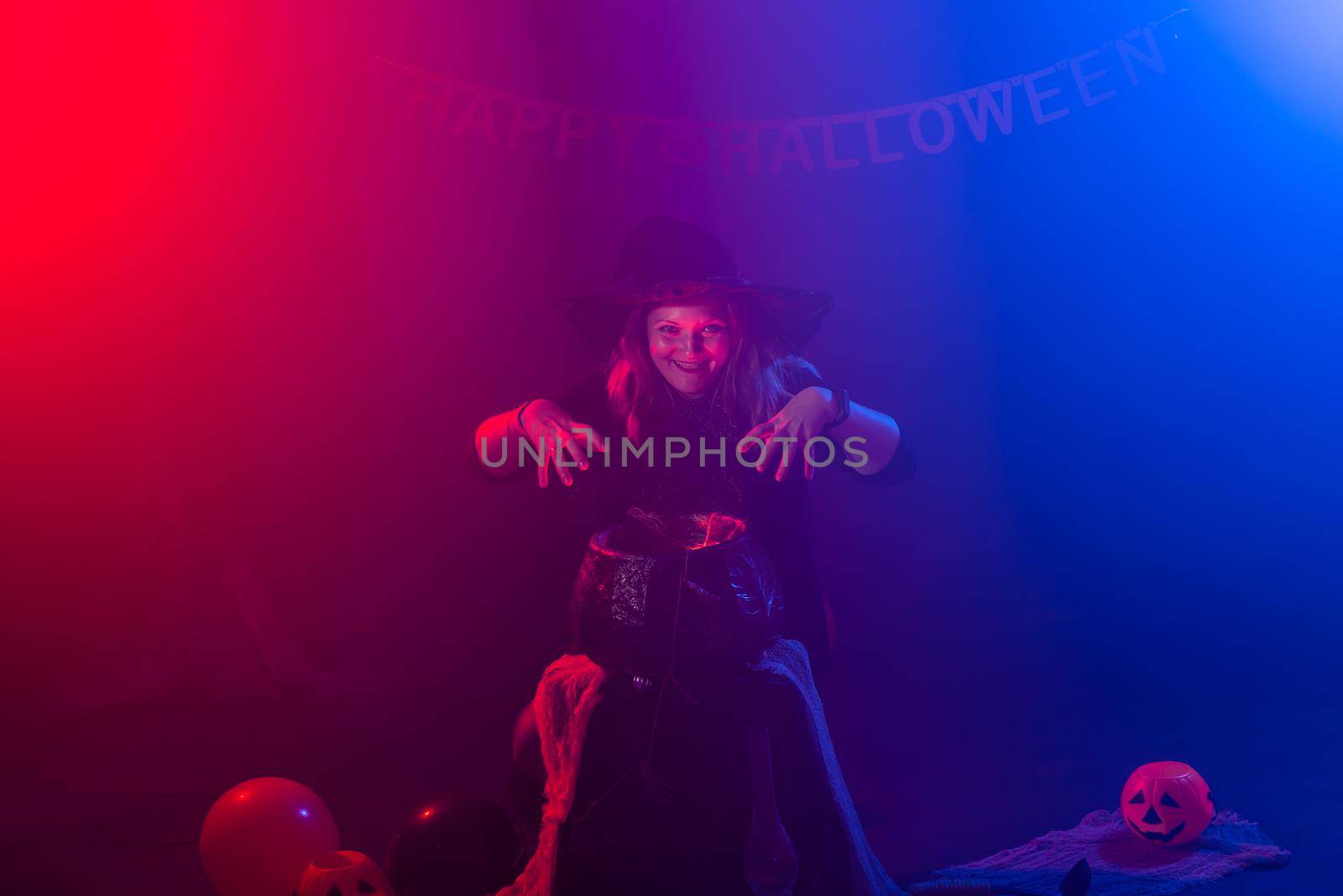 Woman in witch costume for Halloween. Halloween night