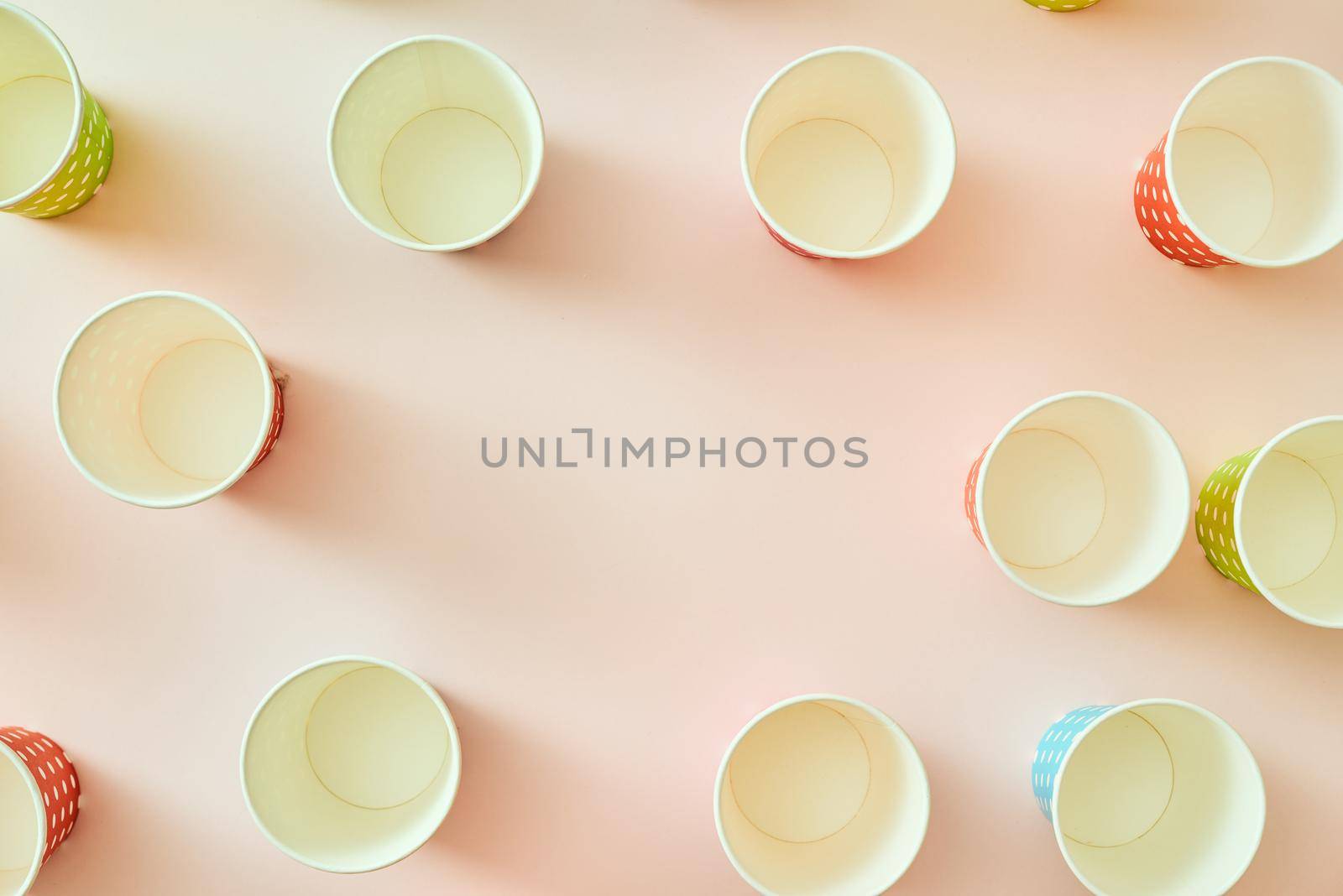 paper fashion cups on a delicate pink background