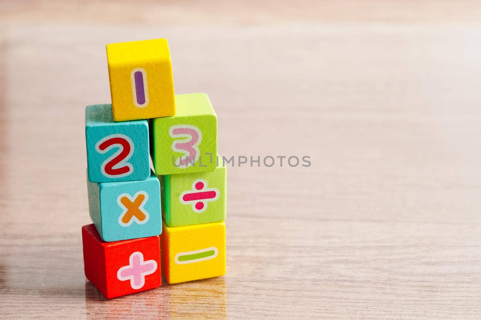 Number wood block cubes for learning Mathematic, education math concept.