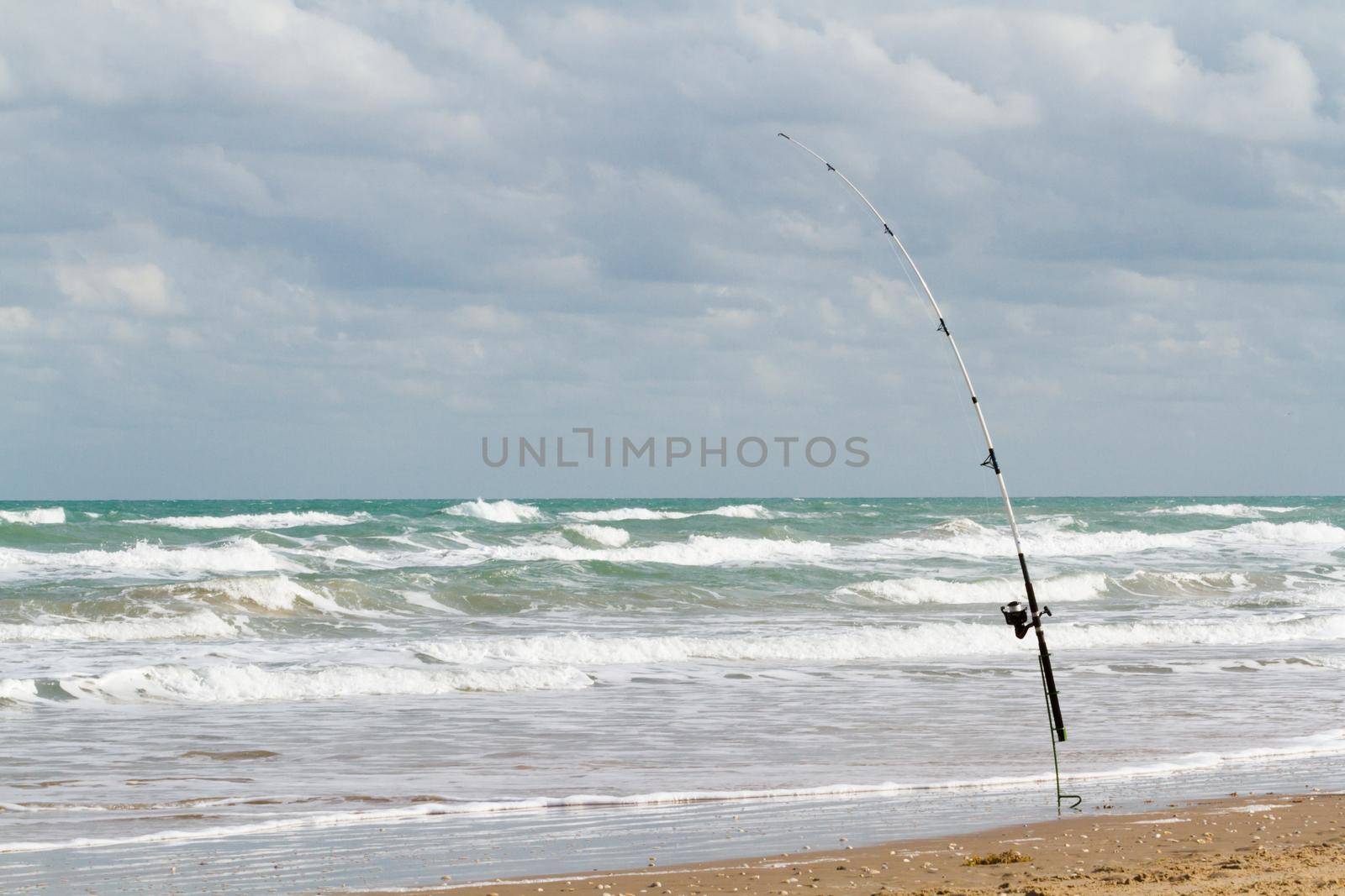 Fishing on the beach of South Padre Island, TX.