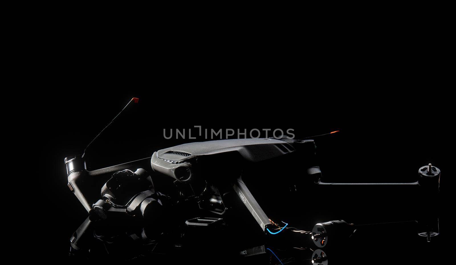 Broken gimbal camera and drone motor arm after crash. The crashed drone DJI Mavic 3 after falling from a height. 08.05,2022. Rostov region, Russia.