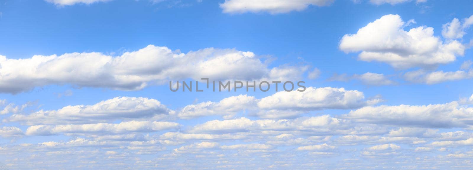 Beautiful panorama of the sky. Panorama of the sky in the clouds. Clouds float across the blue sky.