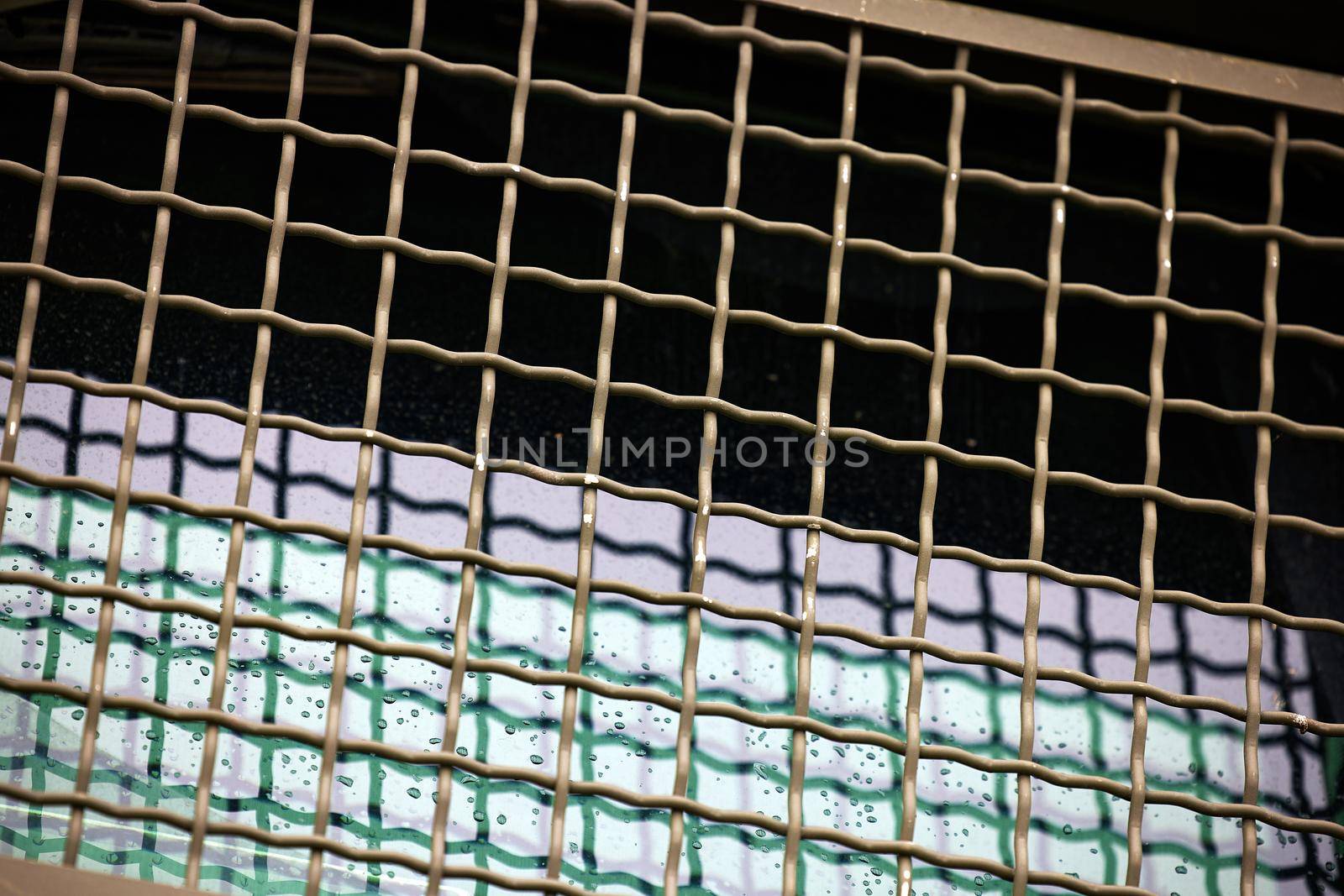 Protective grille on the windshield of an armored car. Police armored car with glass protection. MRAP Armored Transport Vehicle.