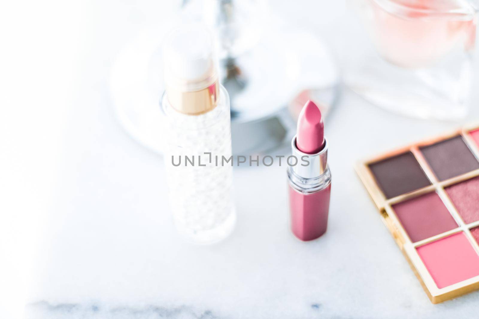 Cosmetic branding, girly and glamour concept - Cosmetics, makeup products on dressing vanity table, lipstick, foundation base, nailpolish and eyeshadows for luxury beauty and fashion brand ads design