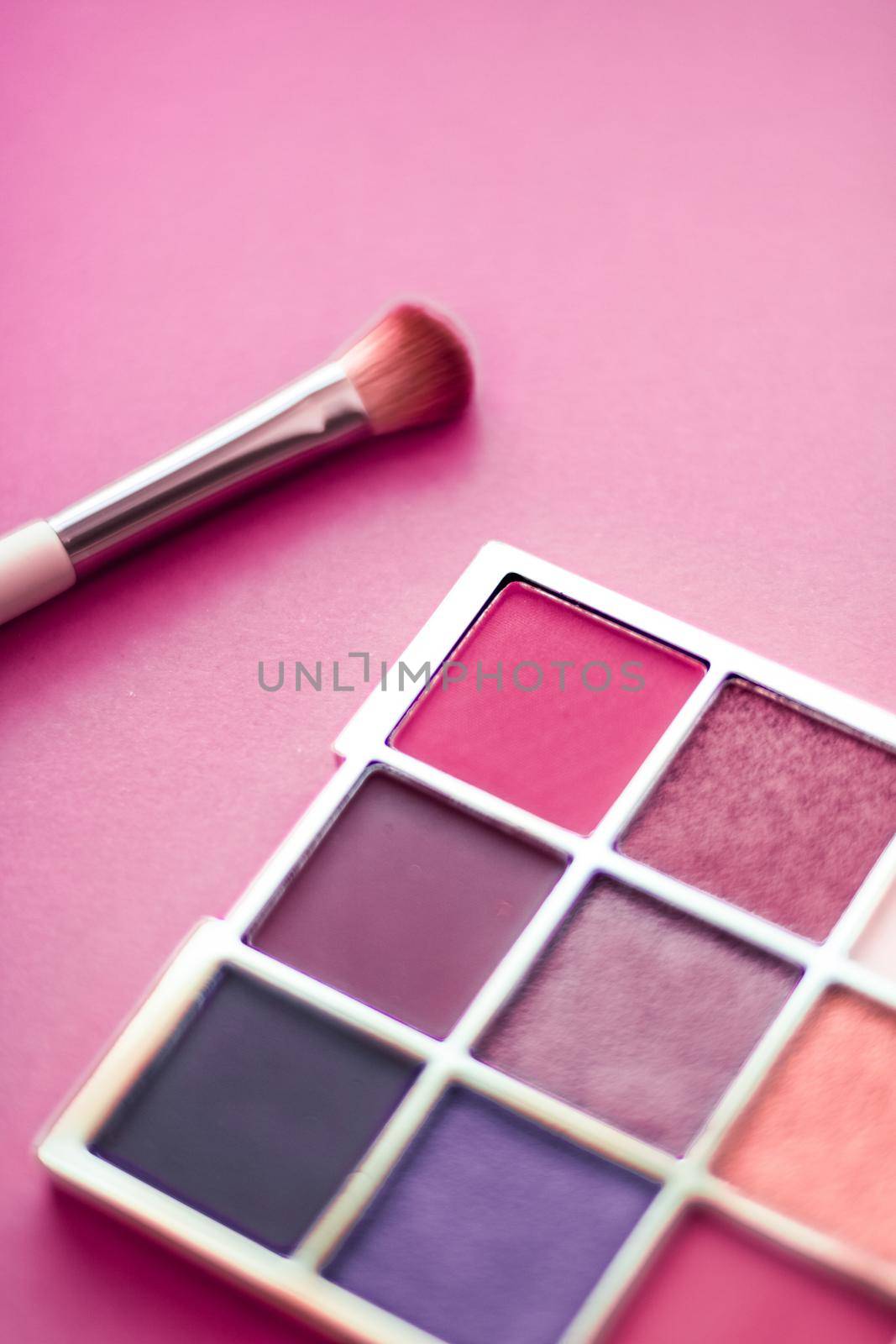 Eyeshadow palette and make-up brush on pink background, eye shadows cosmetics product as luxury beauty brand promotion and holiday fashion blog design by Anneleven