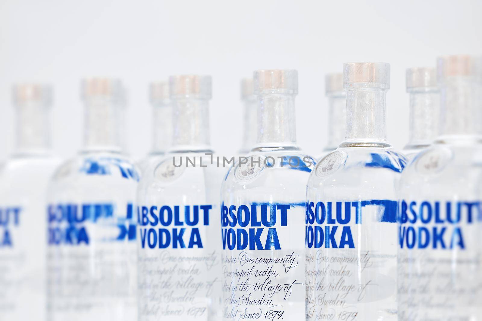 Bottles of Swedish vodka Absolut. Bottles of Absolut Vodka on a shelf of a duty free shop in Dubai Airport. 12,02,2022, Dubai, UAE.