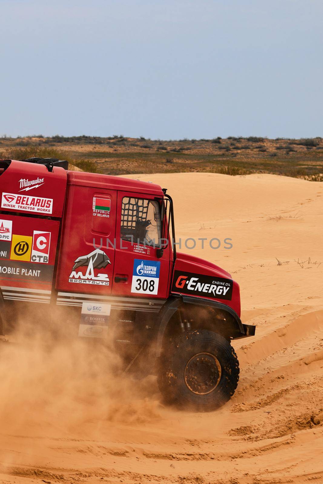 Sports truck MAZ Sport-auto team gets over the difficult part of the route during the Rally raid in sand. THE GOLD OF KAGAN-2021. 26.04.2021 Astrakhan, Russia.