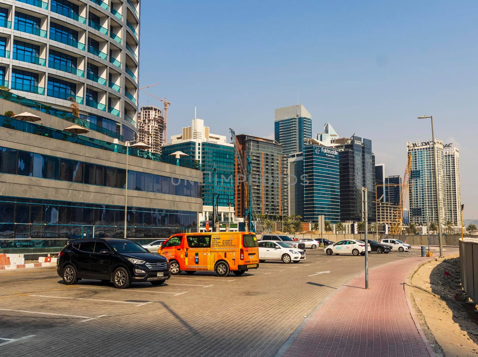 Dubai, UAE - 09.29.2022 - Modern buildings in Business Bay district