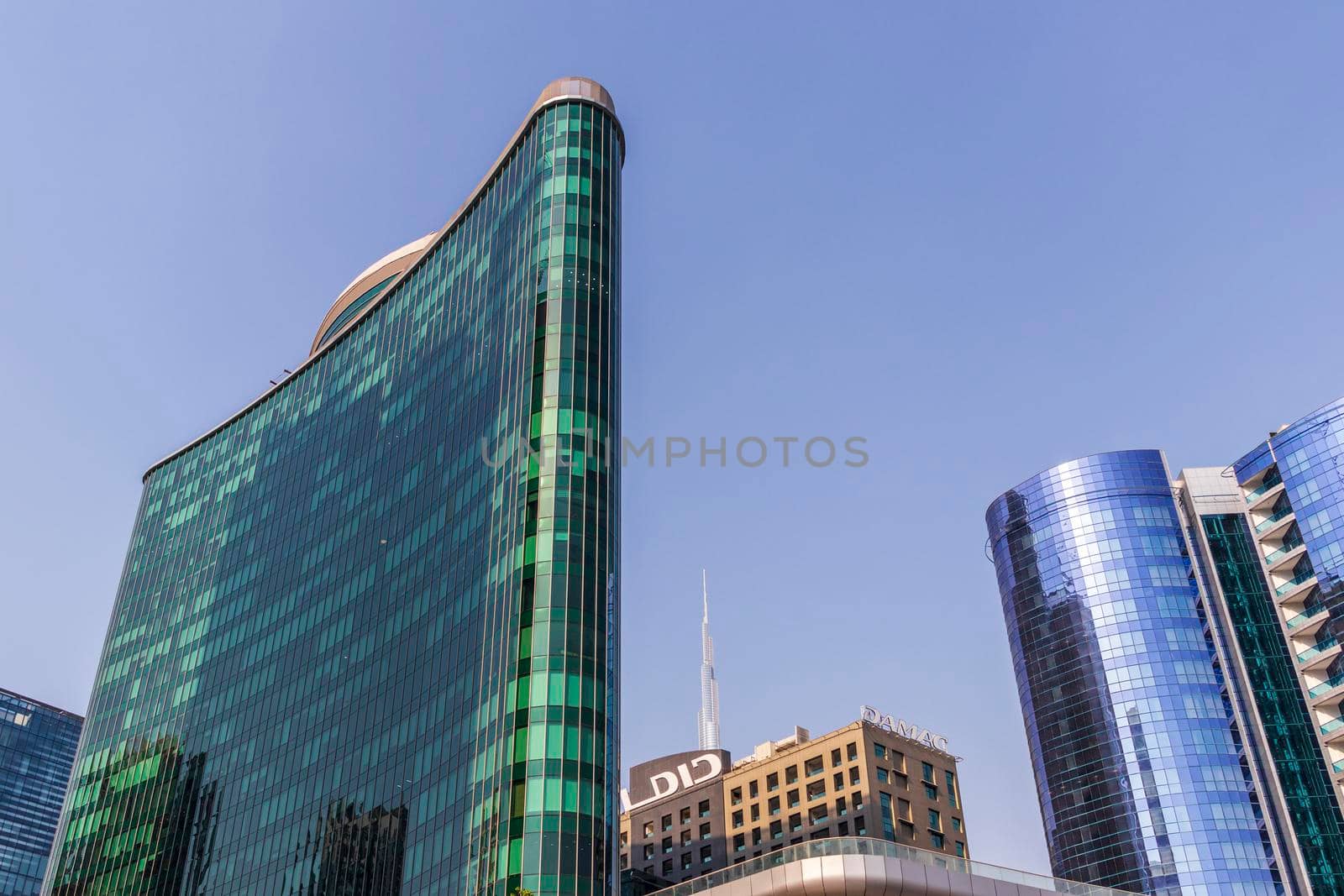 Dubai, UAE - 09.29.2022 - Modern buildings in Business Bay district