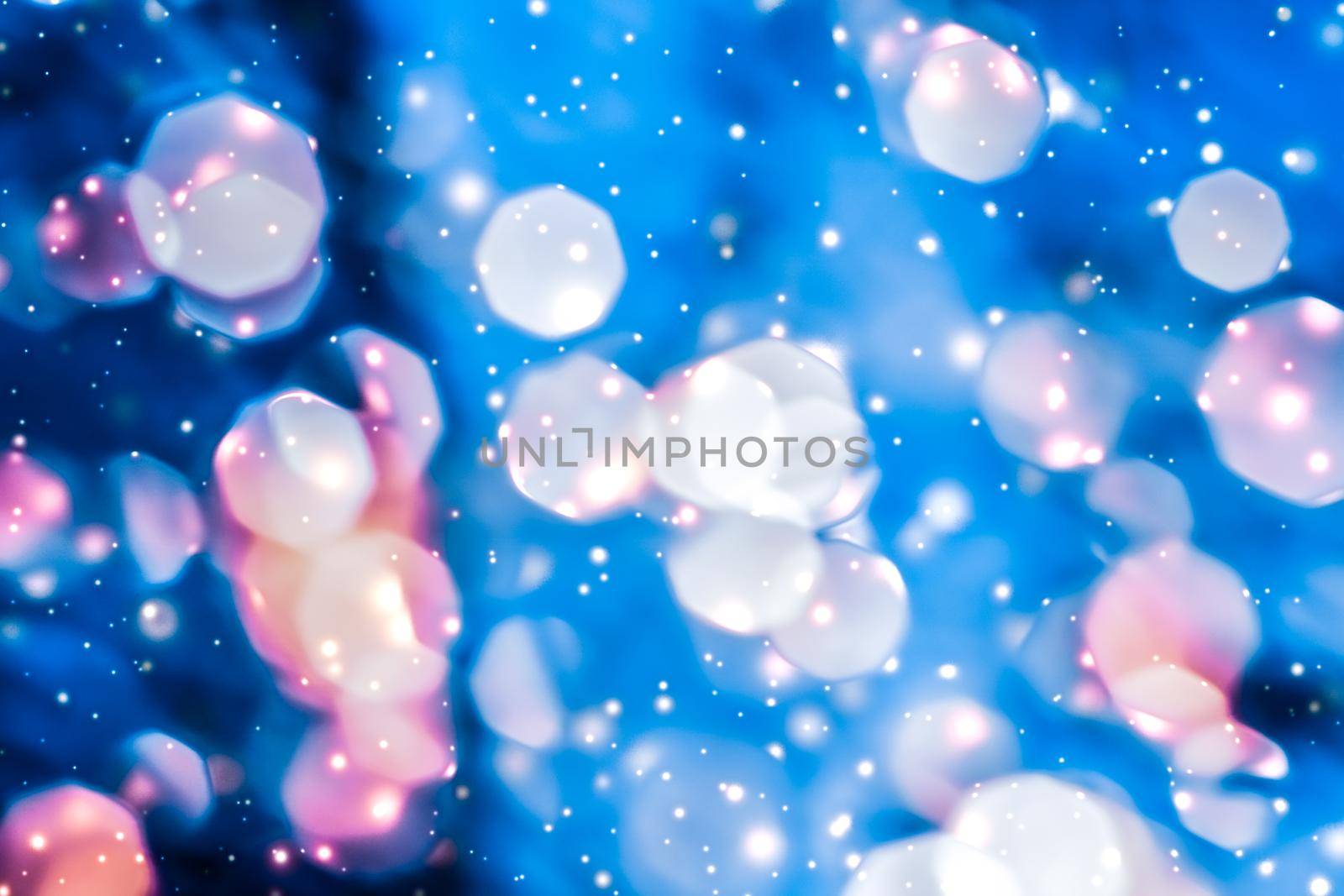 Christmas lights, New Years Eve fireworks and abstract texture concept - Magic sparkling shiny glitter and glowing snow, luxury winter holiday background