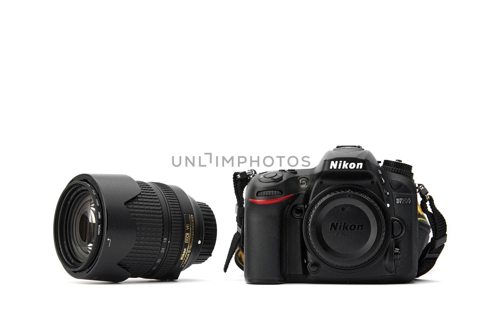 Nikon DSLR Camera Nikon D7200 with a whale lens isolated on white background. Detail photos of Nikon D7200 body with grip. 03.04.2021, Rostov region, Russia.