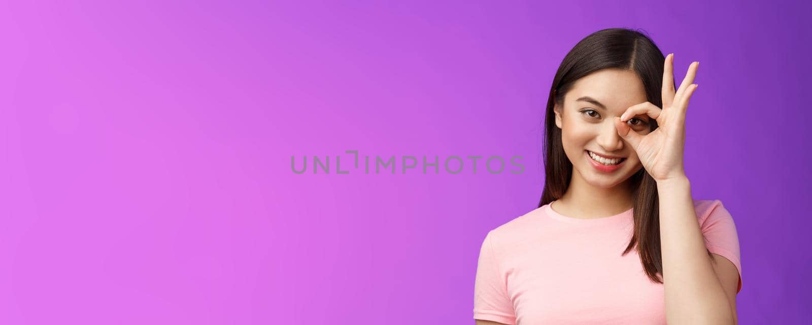 Close-up tender silly friendly asian woman stay positive, give permission show okay ok sign pleased, satisfied good quality, accept terms, delighted product, stand purple background by Benzoix
