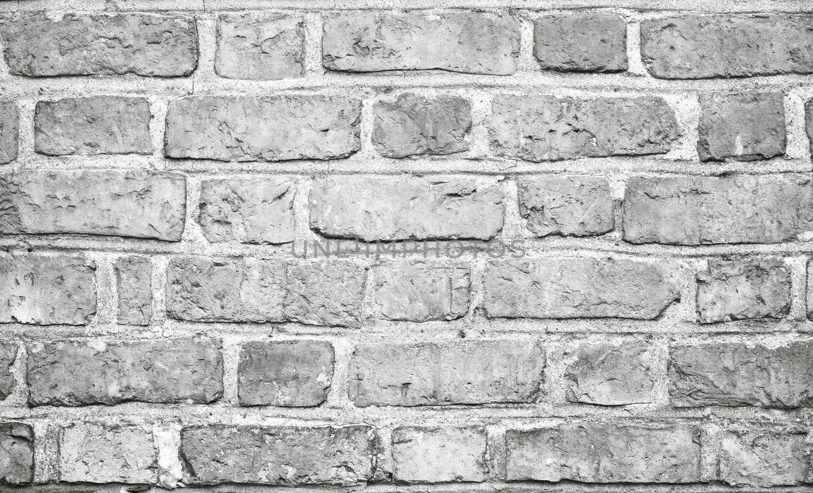Old brick wall. Horizontal wide brick wall background. Vintage house facade
