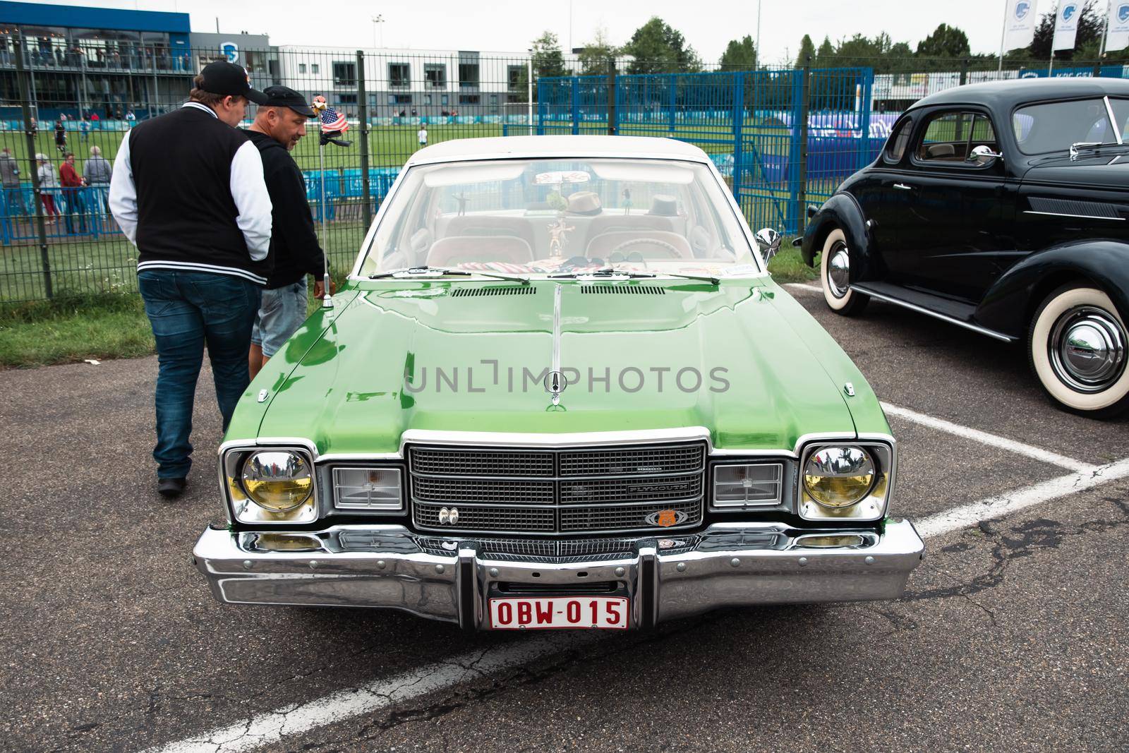 Genk, BELGIUM, August 18, 2021: classic summer meet of oldtimer at The Luminus Arena Genk, Green Plymouth Volare 1977 . High quality photo