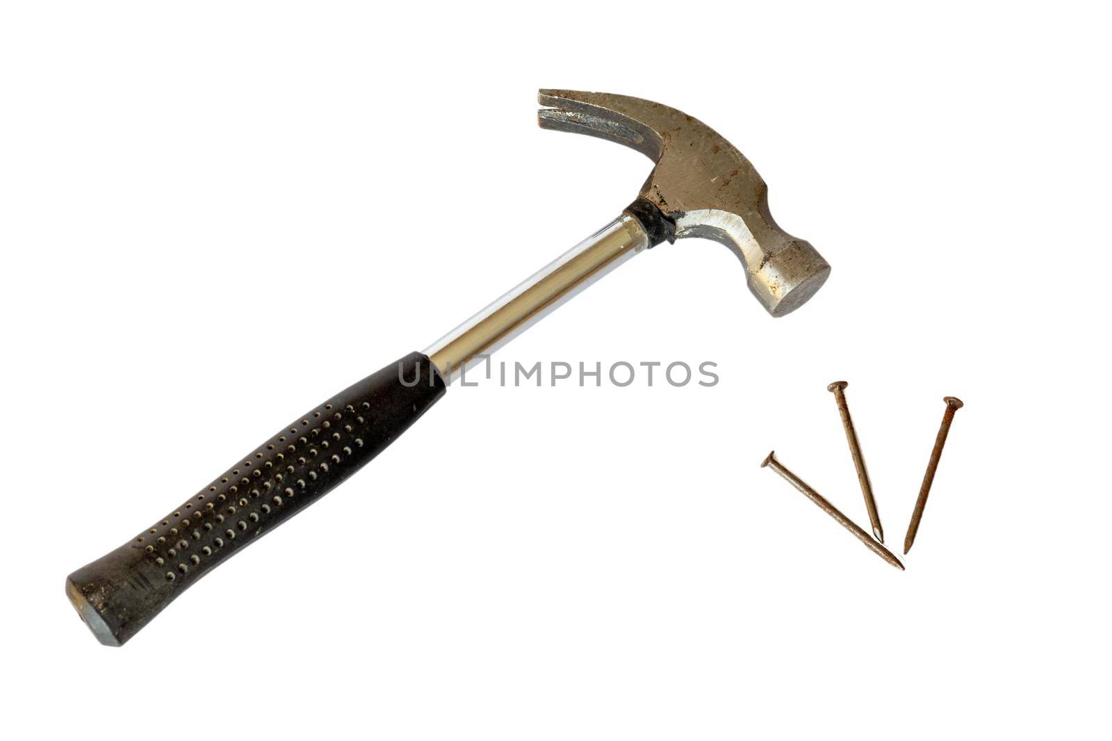 Hammer with black rubber handle with nails on white isolated background