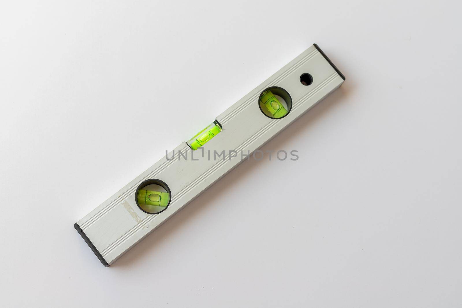 Spirit level tool top view on white isolated background