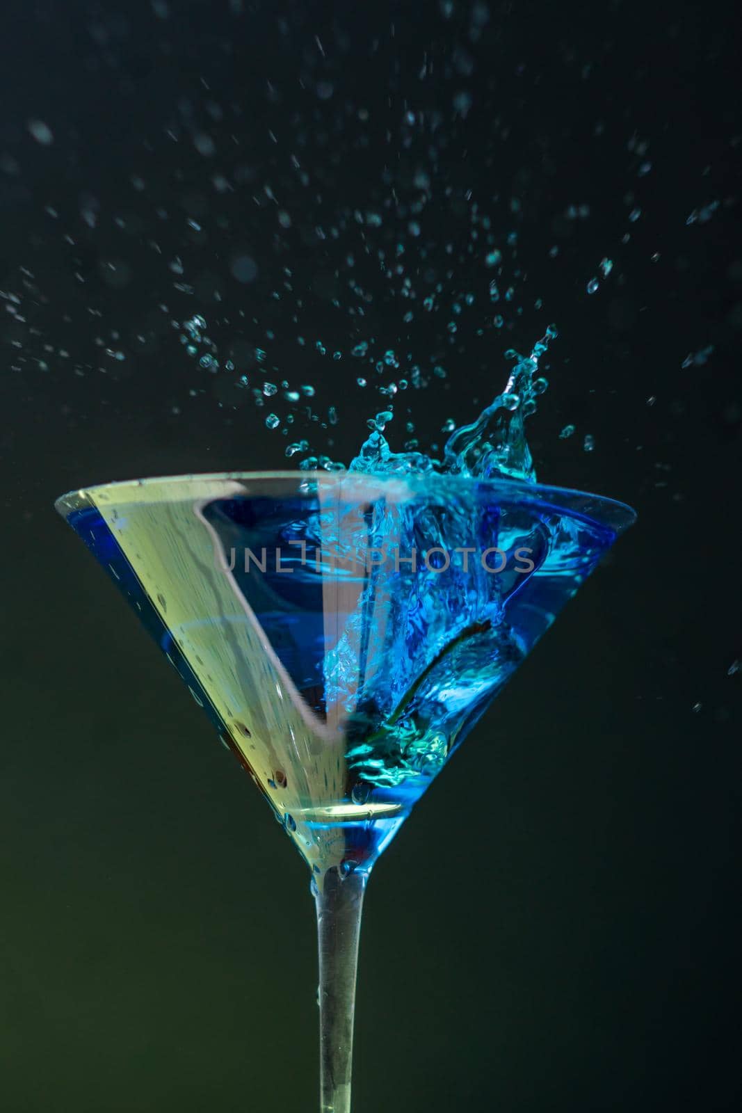 cocktail glasses with different flavors and colors with splash effect by joseantona