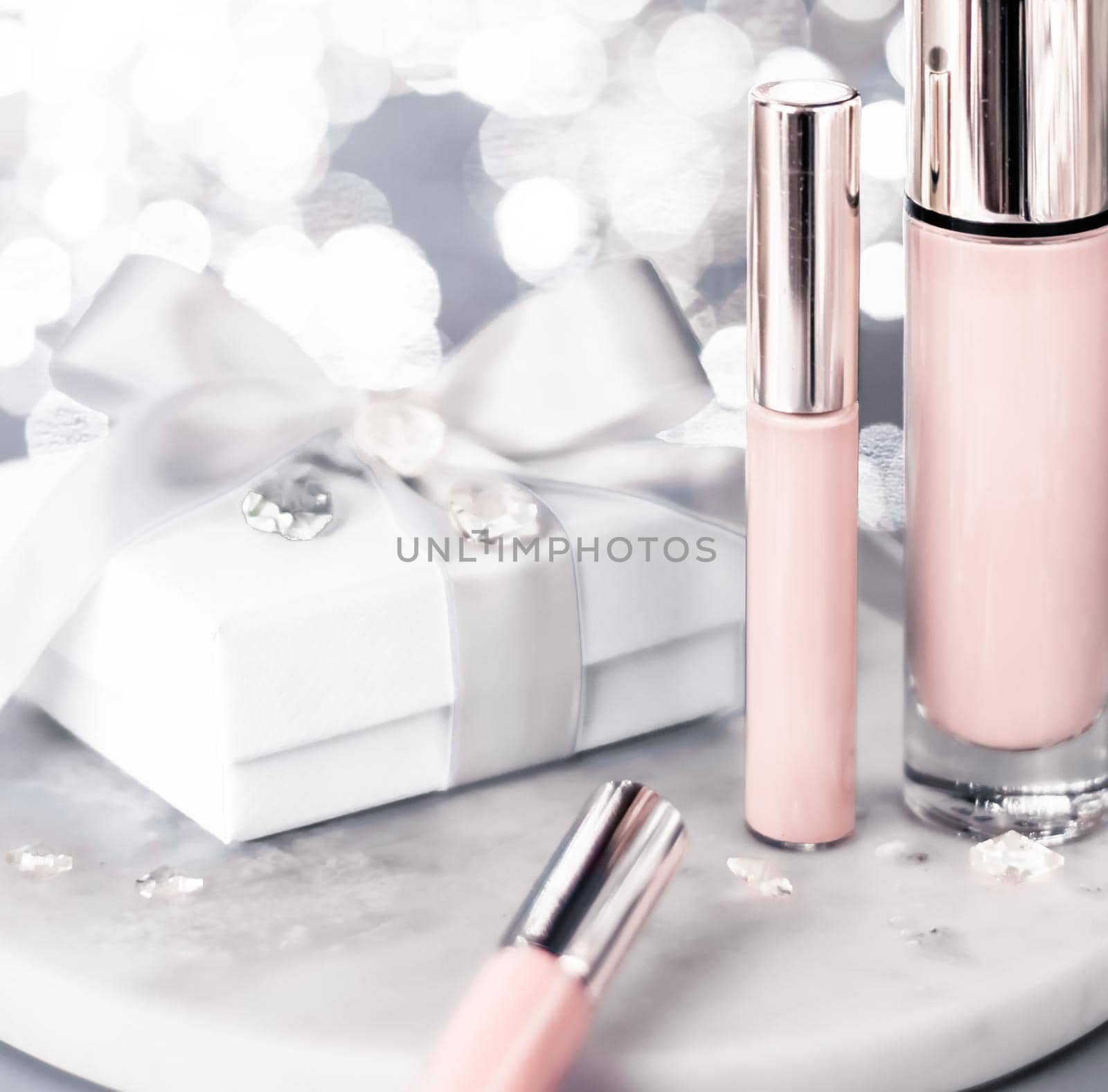 Cosmetic branding, Christmas glitter and girly blog concept - Holiday make-up foundation base, concealer and white gift box, luxury cosmetics present and blank label products for beauty brand design