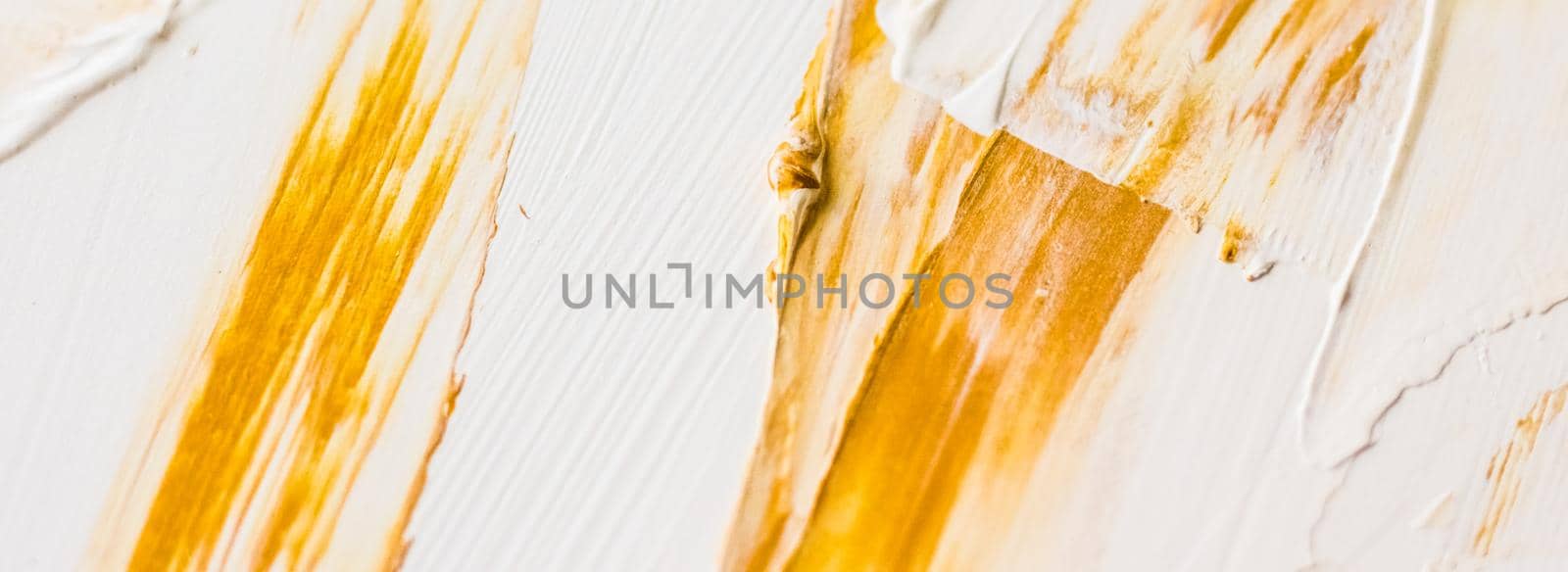 Art, branding and glamour concept - Artistic abstract texture background, golden acrylic paint brush stroke, textured ink oil splash as print backdrop for luxury holiday brand, flatlay banner design