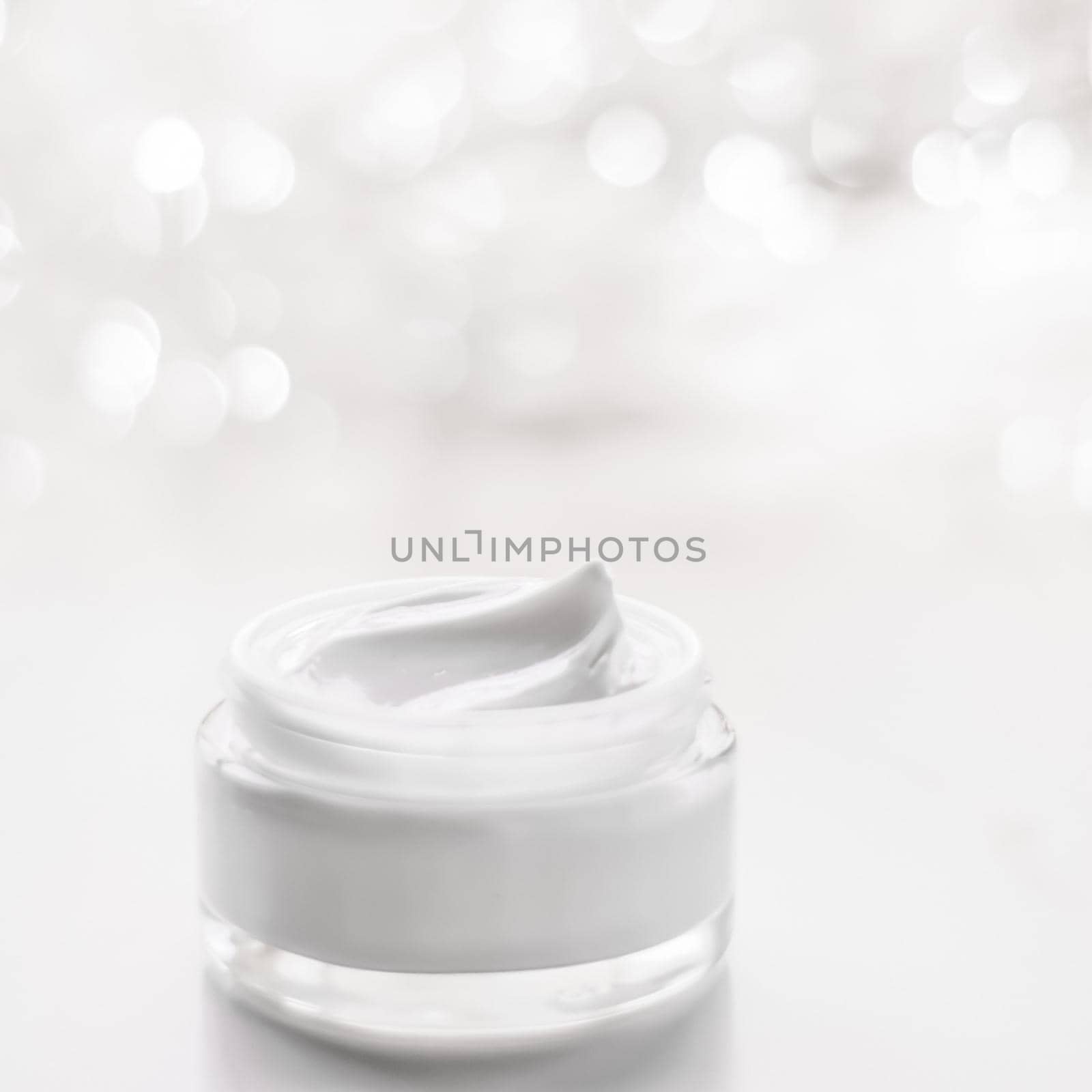 Cosmetic branding, gift and spa concept - Facial cream moisturizer jar on holiday glitter background, moisturizing skin care as lifting emulsion, anti-age cosmetics for luxury beauty skincare brand