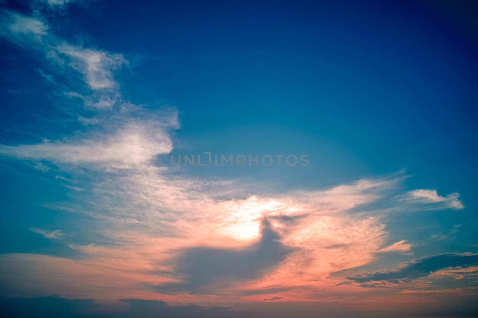 Dramatic sunset with twilight color sky and clouds nature background by Petrichor