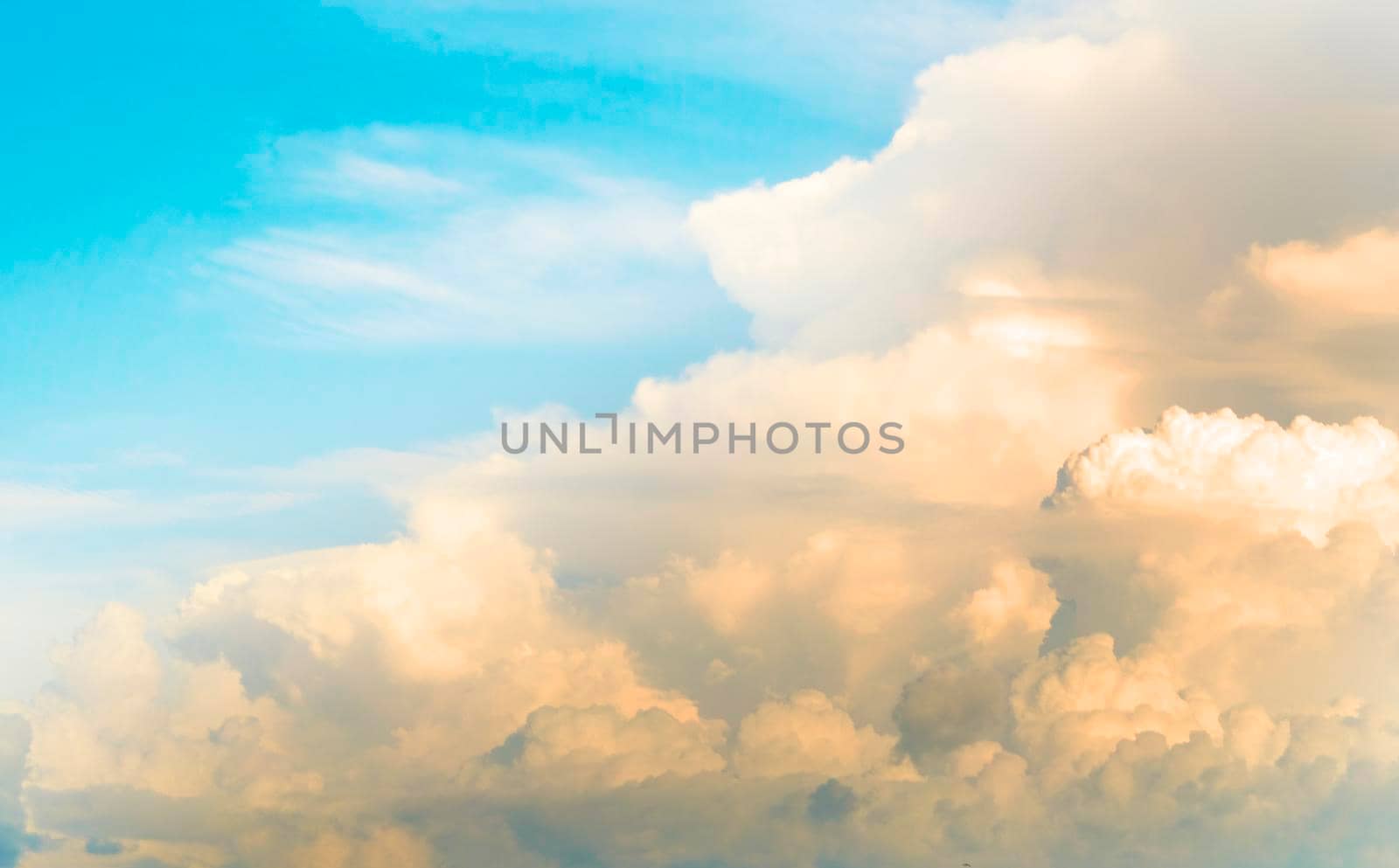 golden cloud and warm gray sky at sunset abstract nature background.