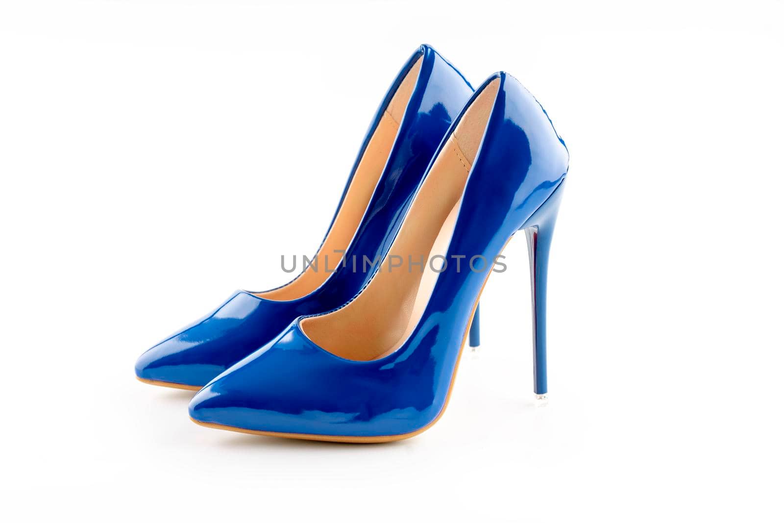 a pair of blue women's high-heeled shoes on white background