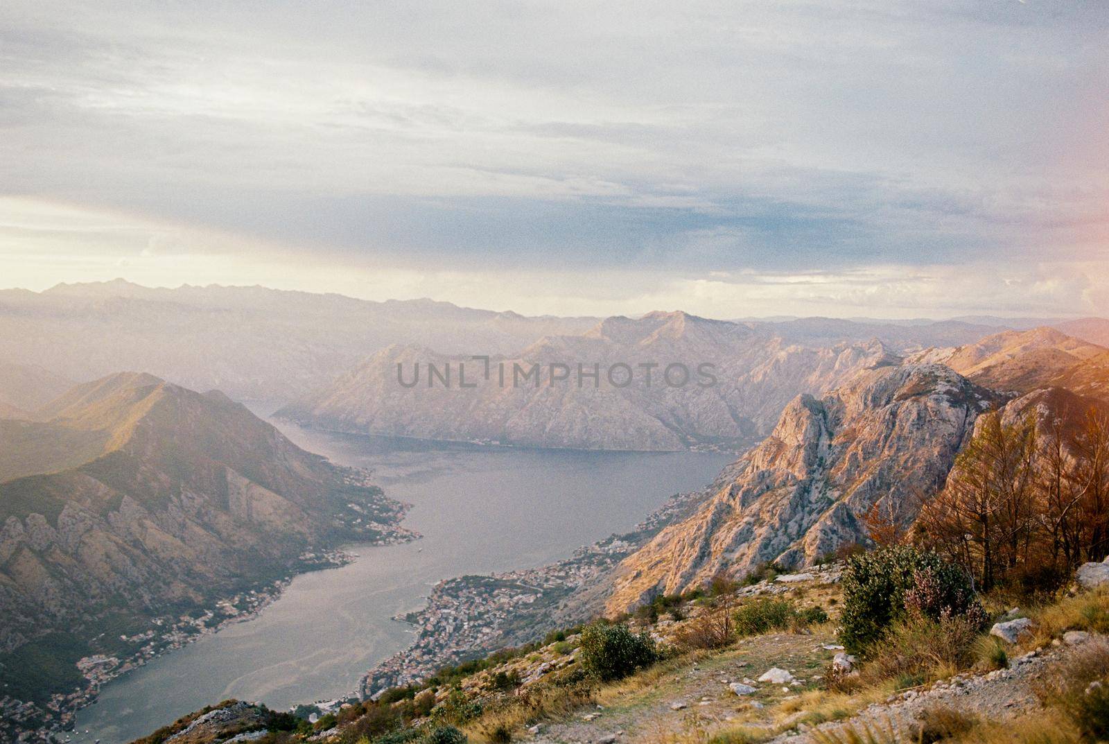 View from the top of the mountain to the valley of the Kotor Bay at sunset. High quality photo
