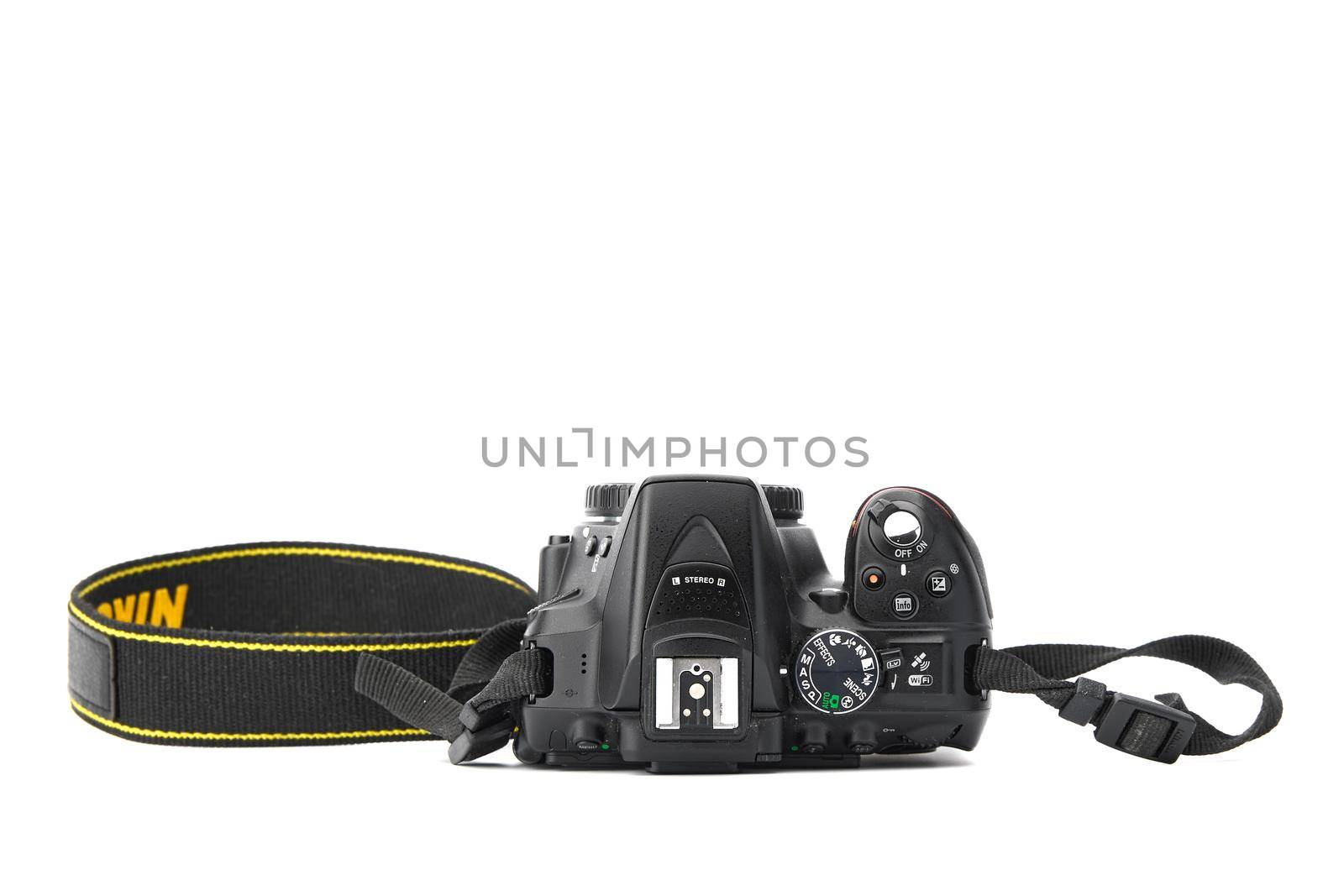 Nikon DSLR Camera Nikon D5300 isolated on white background. Detail photos of Nikon D5300 body with grip. 03.04.2021, Rostov region, Russia.