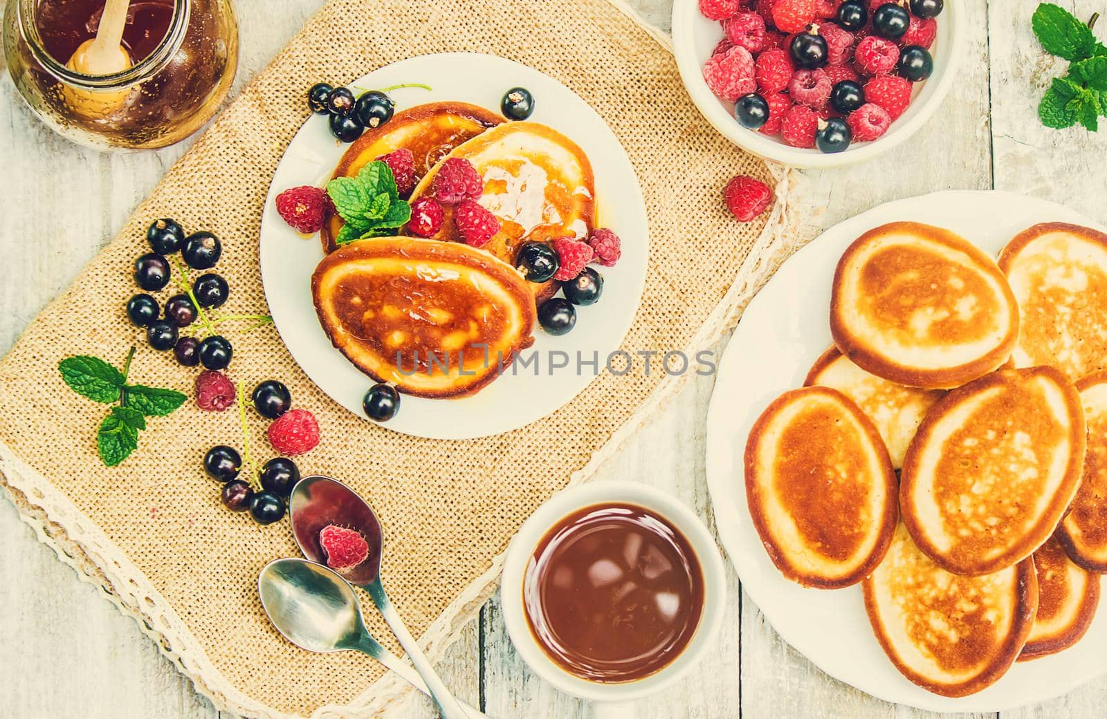 pancakes on a light background. selective focus. by yanadjana