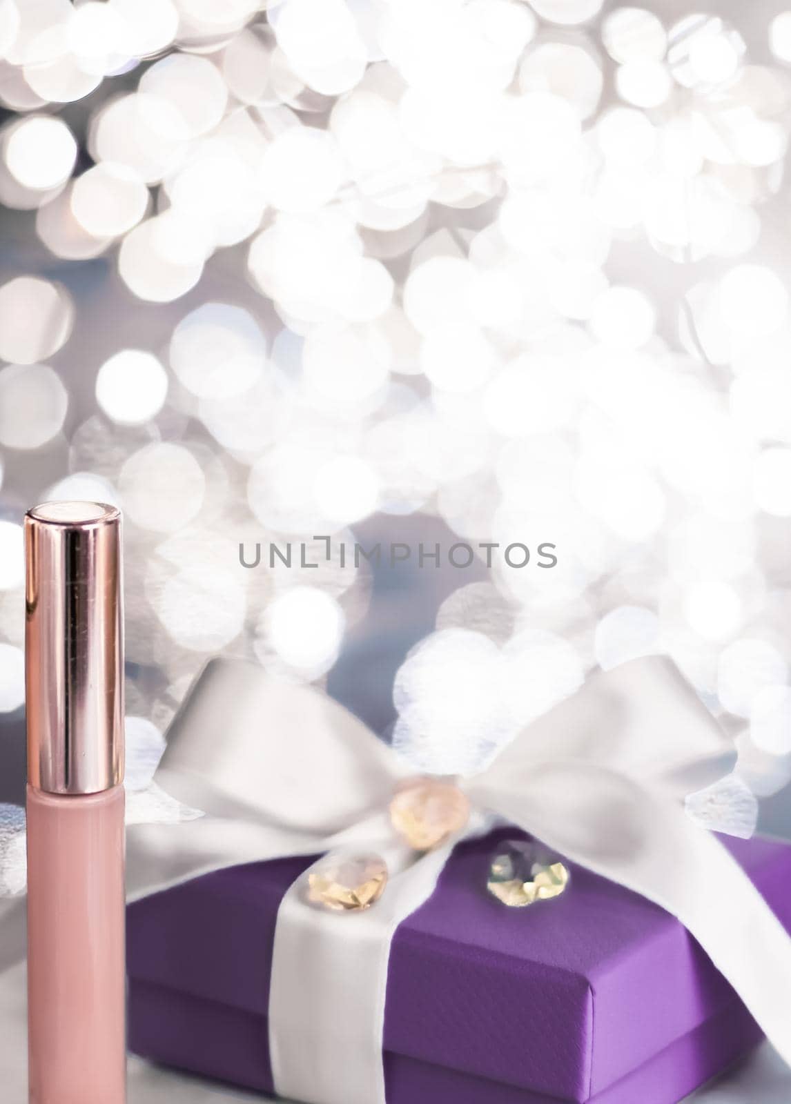 Cosmetic branding, Christmas glitter and girly blog concept - Holiday make-up foundation base, concealer and purple gift box, luxury cosmetics present and blank label products for beauty brand design