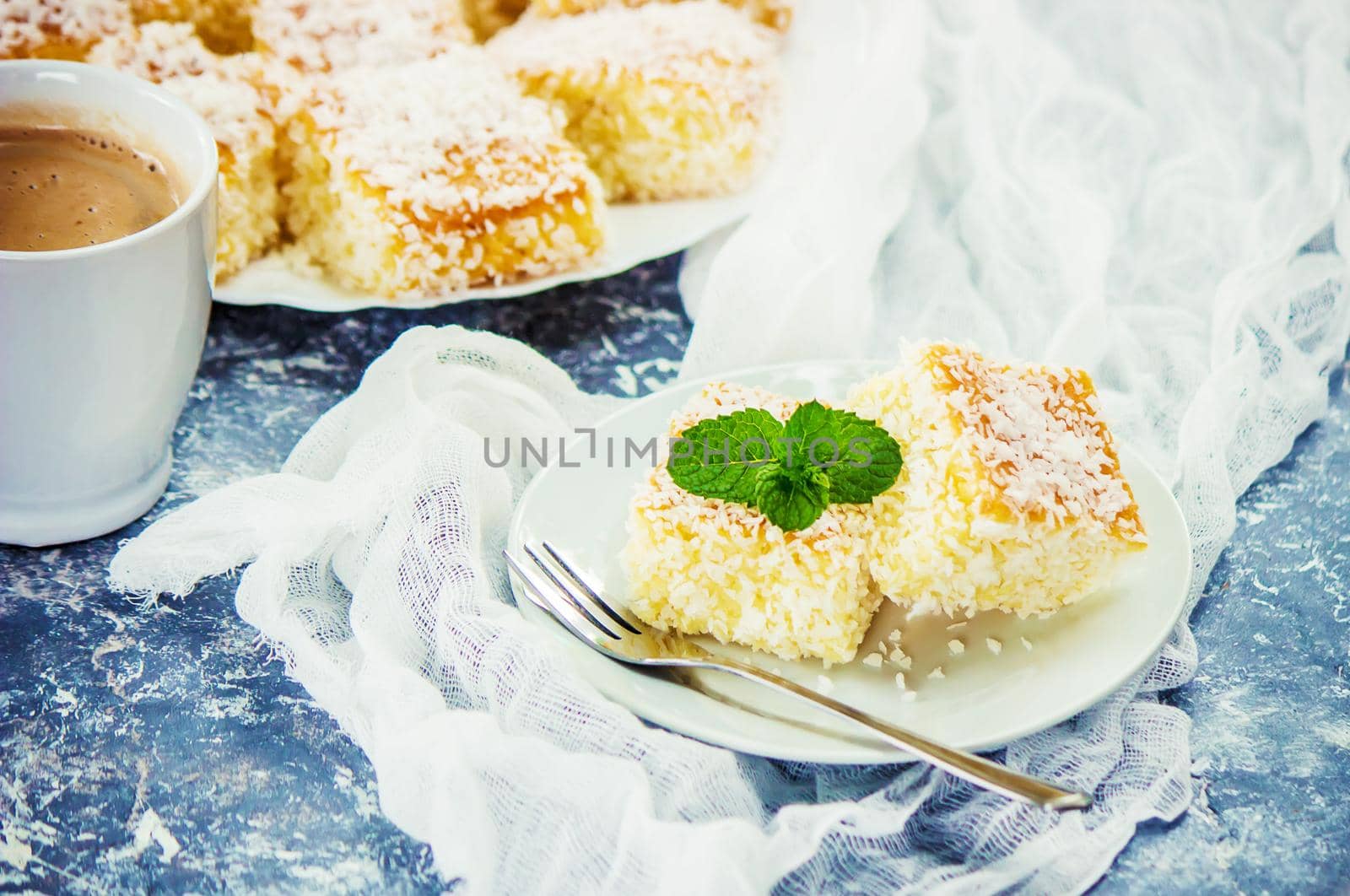 Cakes in coconut shavings. Selective focus. Food.