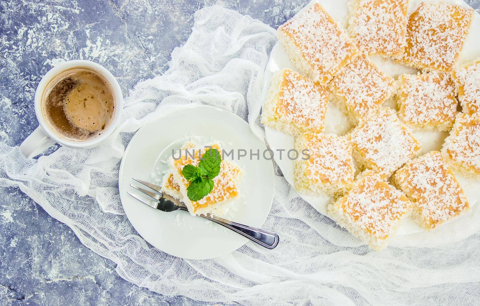 Cakes in coconut shavings. Selective focus. Food. by yanadjana