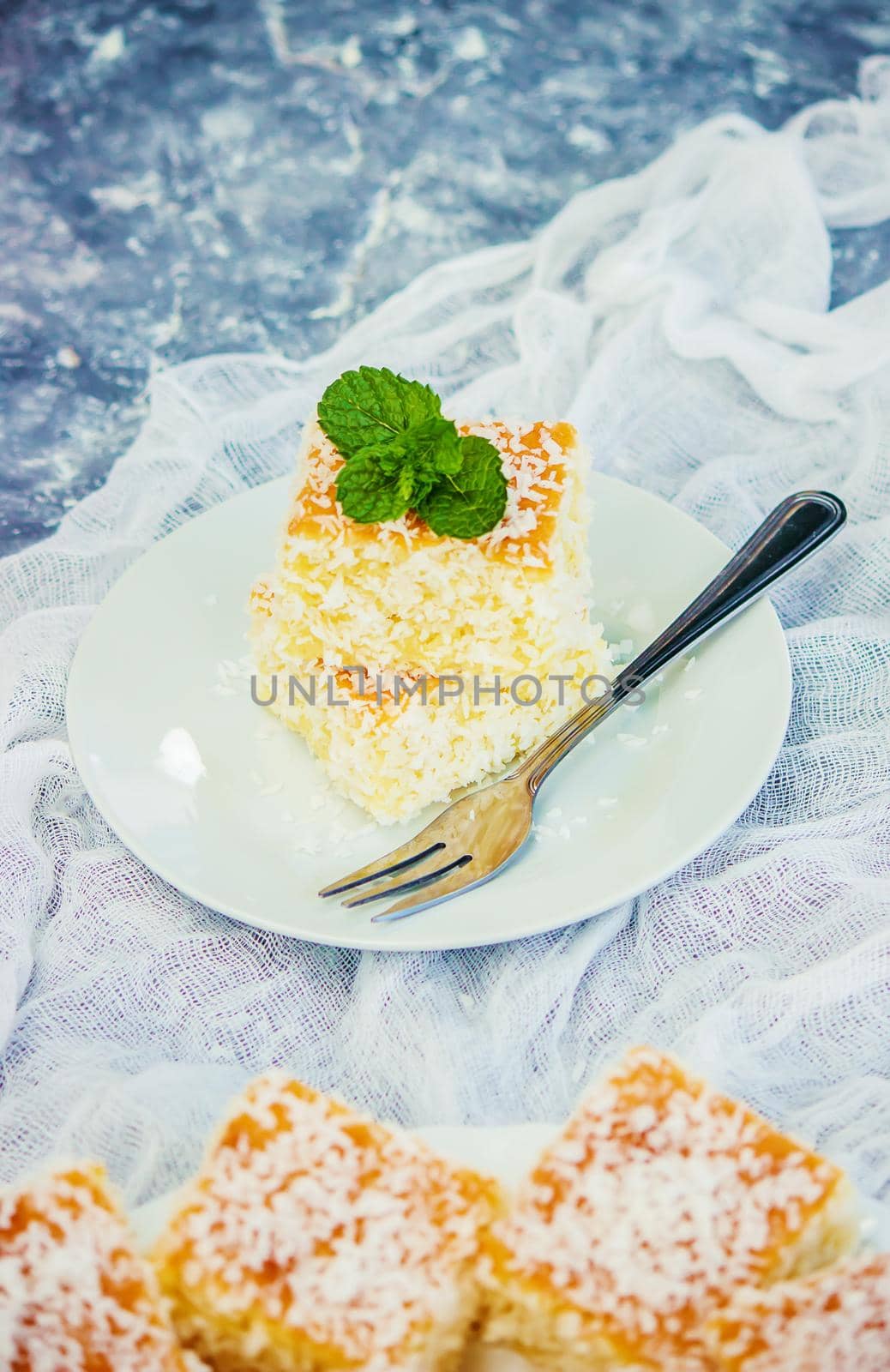 Cakes in coconut shavings. Selective focus. Food.