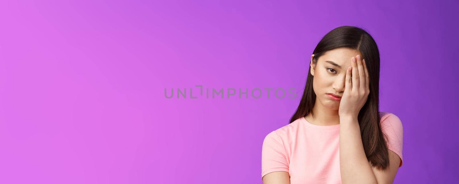 Close-up tired upset girl feeling loser, punch face, make facepalm sign sighing sorrow, exhausted doing hard homework, stand unhappy purple background, regret missed chance by Benzoix