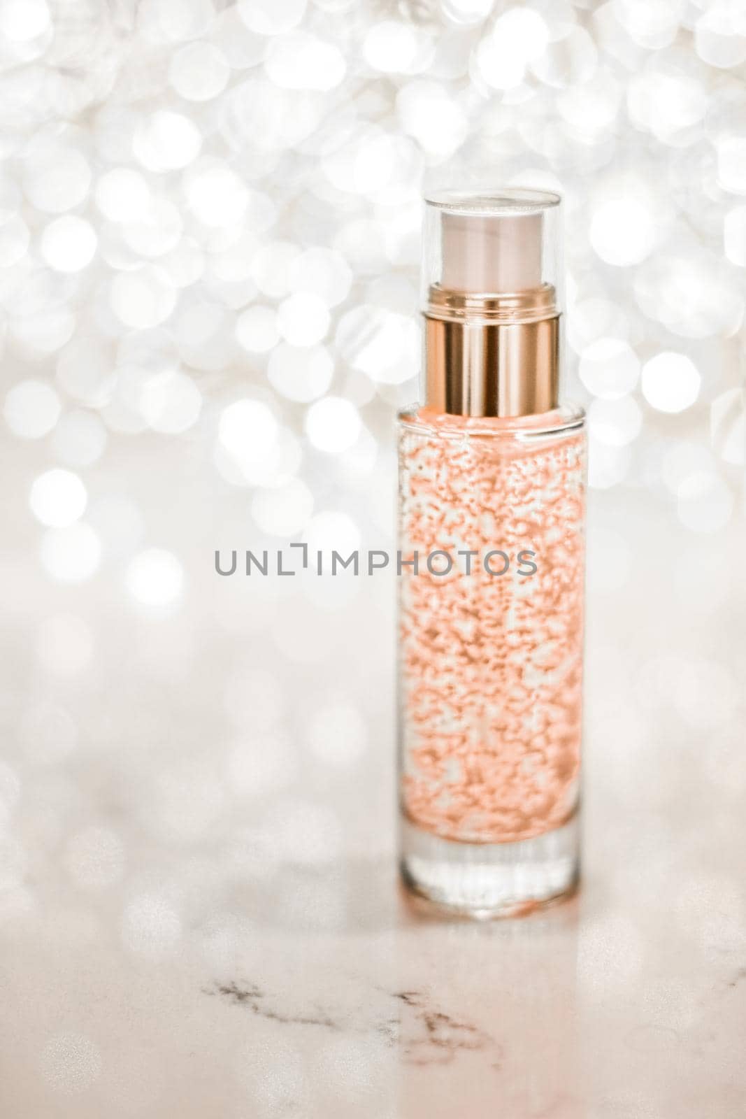 Cosmetic branding, blank label and glamour present concept - Holiday make-up base gel, serum emulsion, lotion bottle and silver glitter, luxury skin and body care cosmetics for beauty brand ads