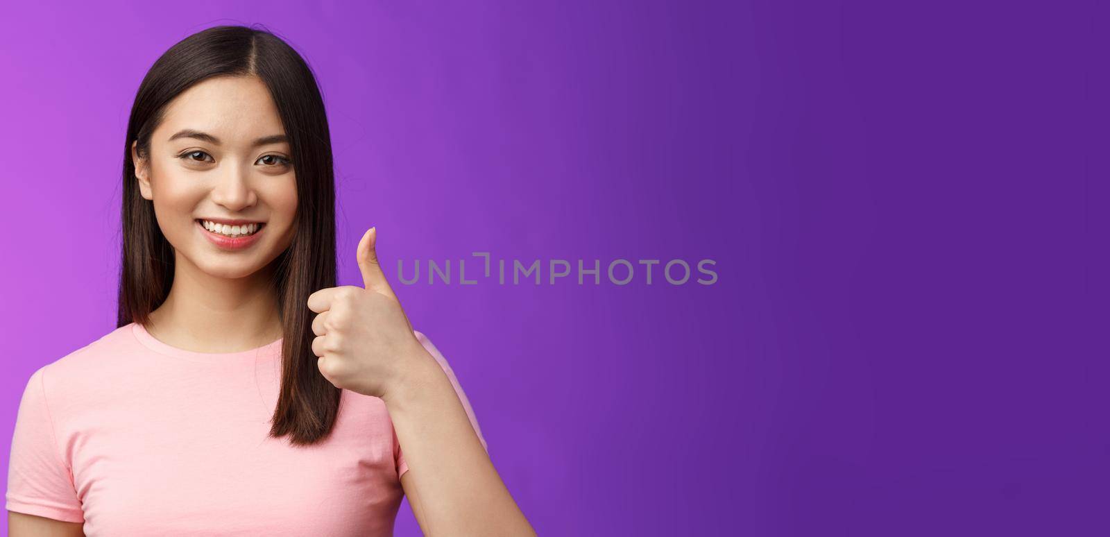 Friendly good-looking supportive asian female friend encourage you keep going, nice work, satisfied good job, smiling approval, show thumb-up gesture, grinning accepting perfect choice by Benzoix