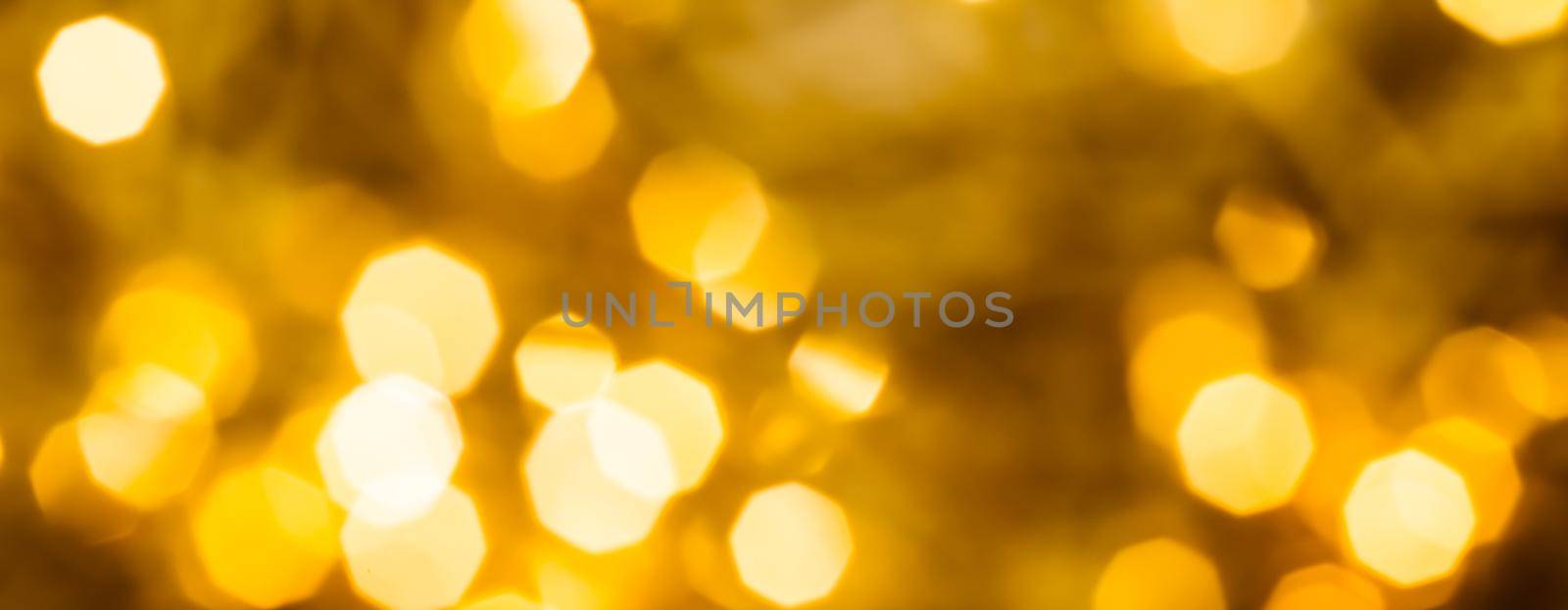 Glamorous gold shiny glow and glitter, luxury holiday background by Anneleven