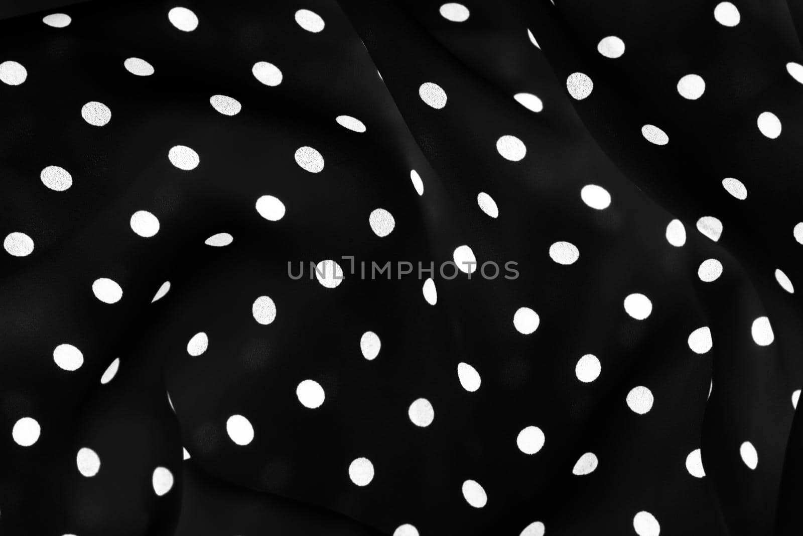 Fashion design, interior decor and classic material concept - Vintage polka dot textile background texture, white dots on black luxury fabric design pattern