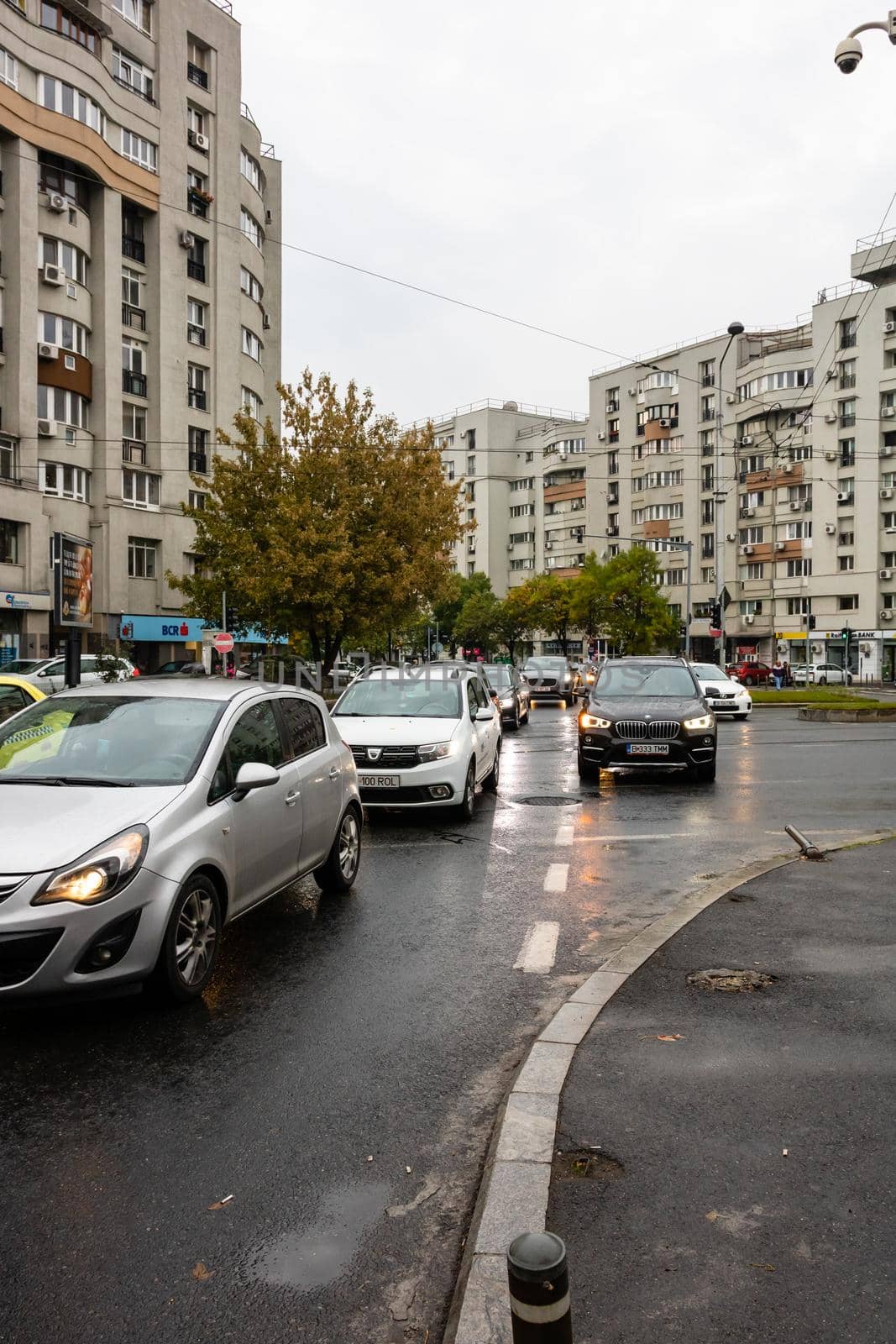 Car traffic at rush hour. Car pollution, traffic jam in Bucharest, Romania, 2022 by vladispas
