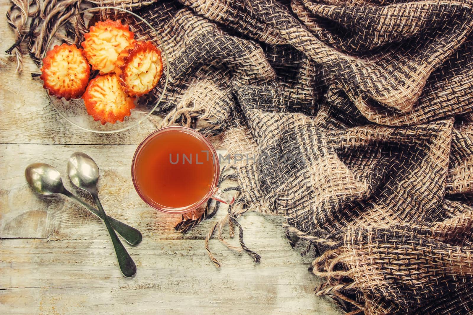 A cup of tea and a cozy autumn background. Selective focus. food.