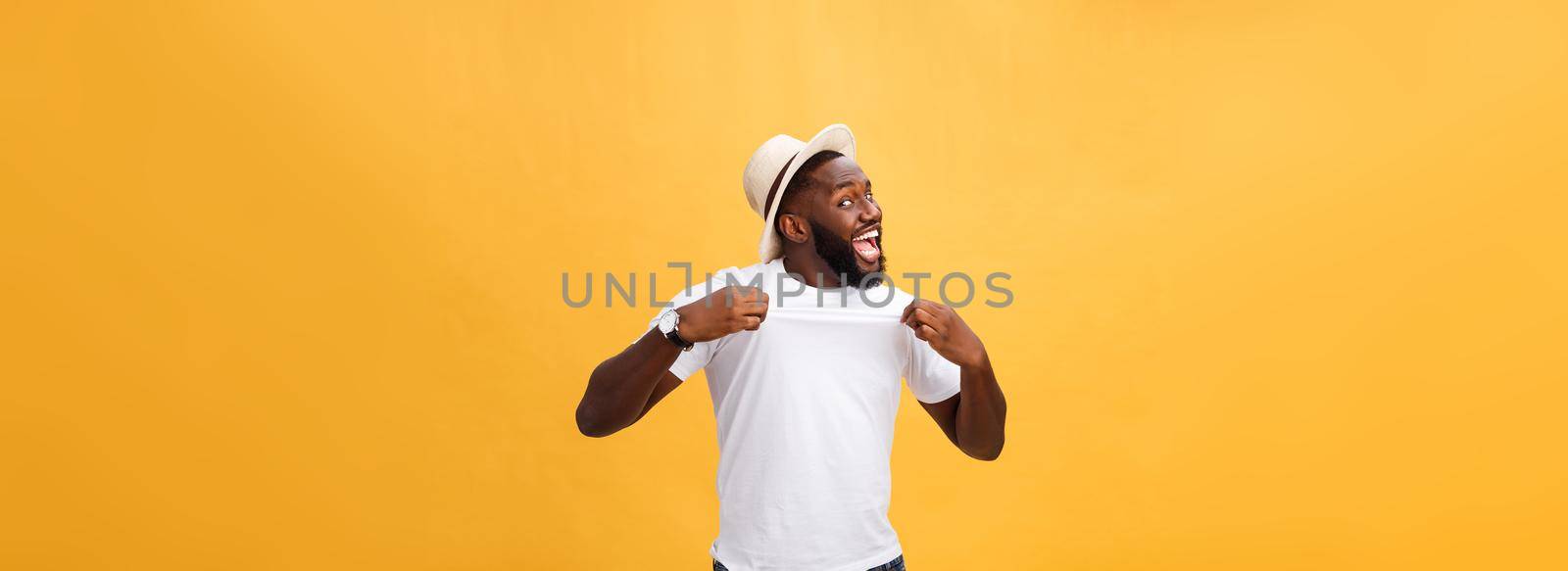 Handsome young Afro-American man employee feeling excited, gesturing actively, keeping fists clenched, exclaiming joyfully with mouth wide opened, happy with good luck or promotion at work by Benzoix