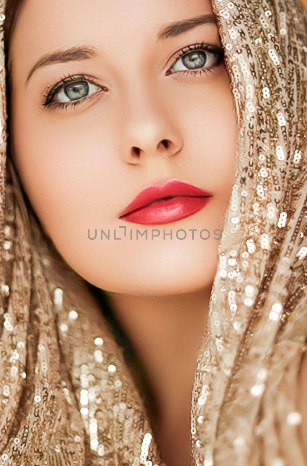 Beauty, luxury fashion and glamour, woman dressed in gold by Anneleven