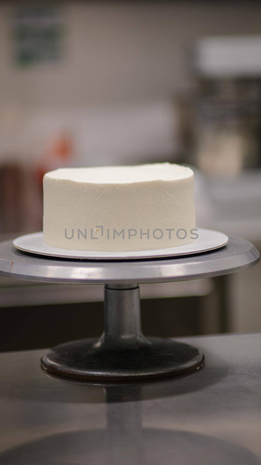 white cake without decor on a stand