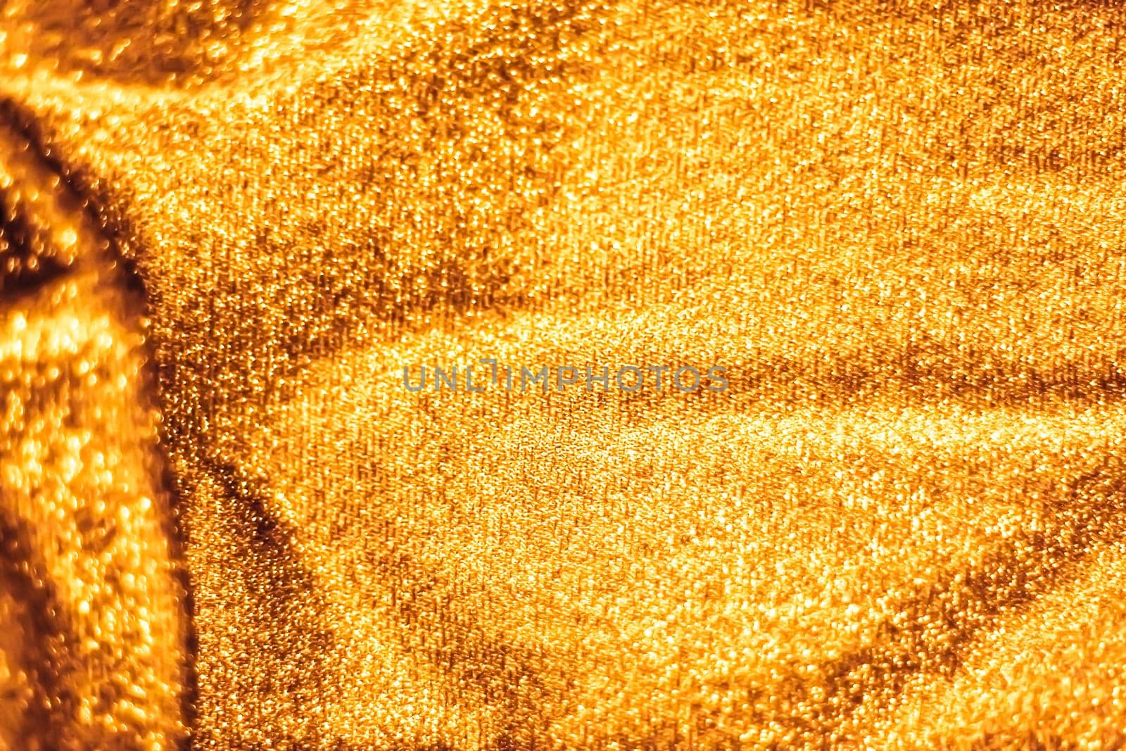 Luxe glowing texture, night club branding and New Years party concept - Golden holiday sparkling glitter abstract background, luxury shiny fabric material for glamour design and festive invitation