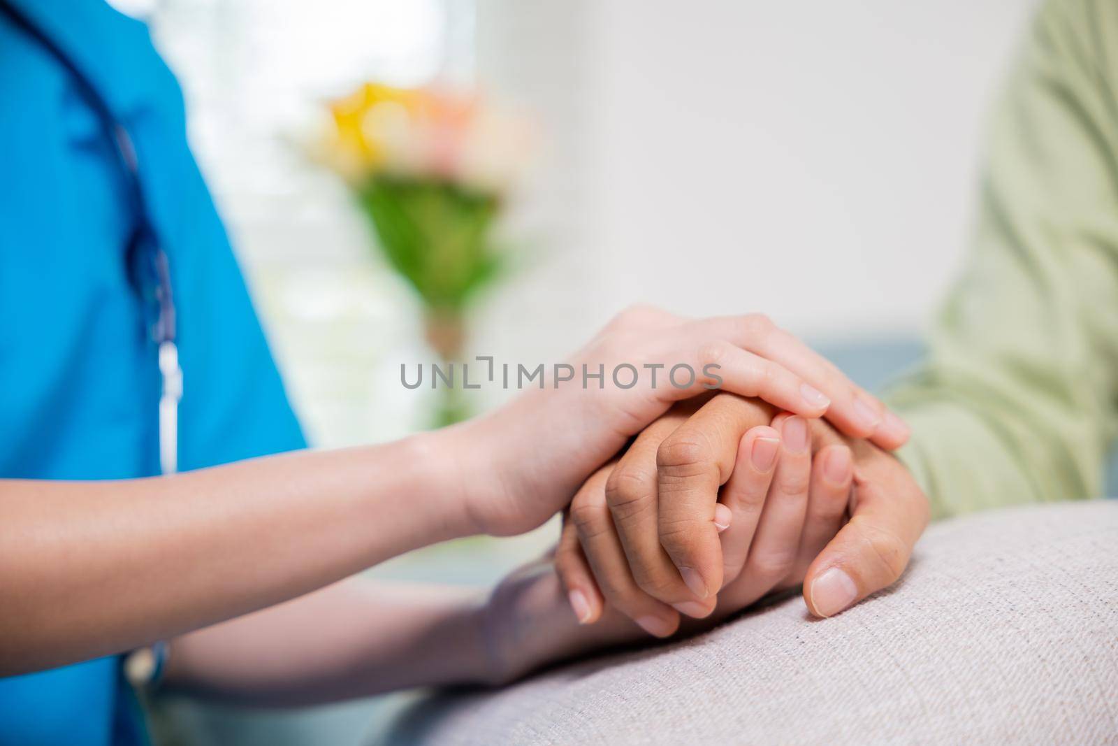Closeup hand. Young woman helping hold hands offering her senior man, Caring nurse helping elderly old man care gets help from hospital, medical health care, International Day for the Elderly concept