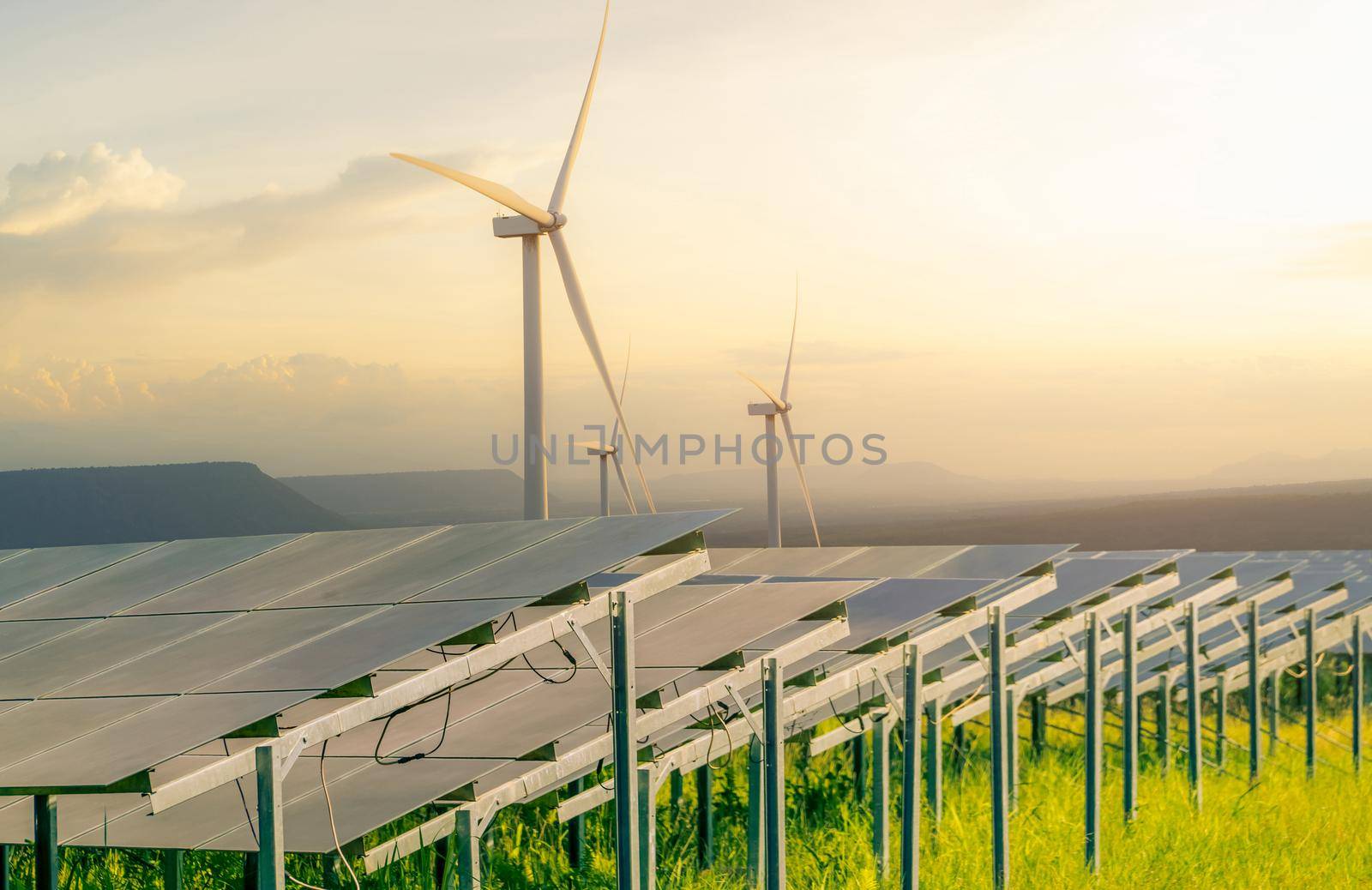 Sustainable energy. Solar and wind turbines farm. Sustainable resources. Solar, wind power. Renewable energy. Sustainable development. Photovoltaic panel. Green energy. Alternative electricity source. by Fahroni
