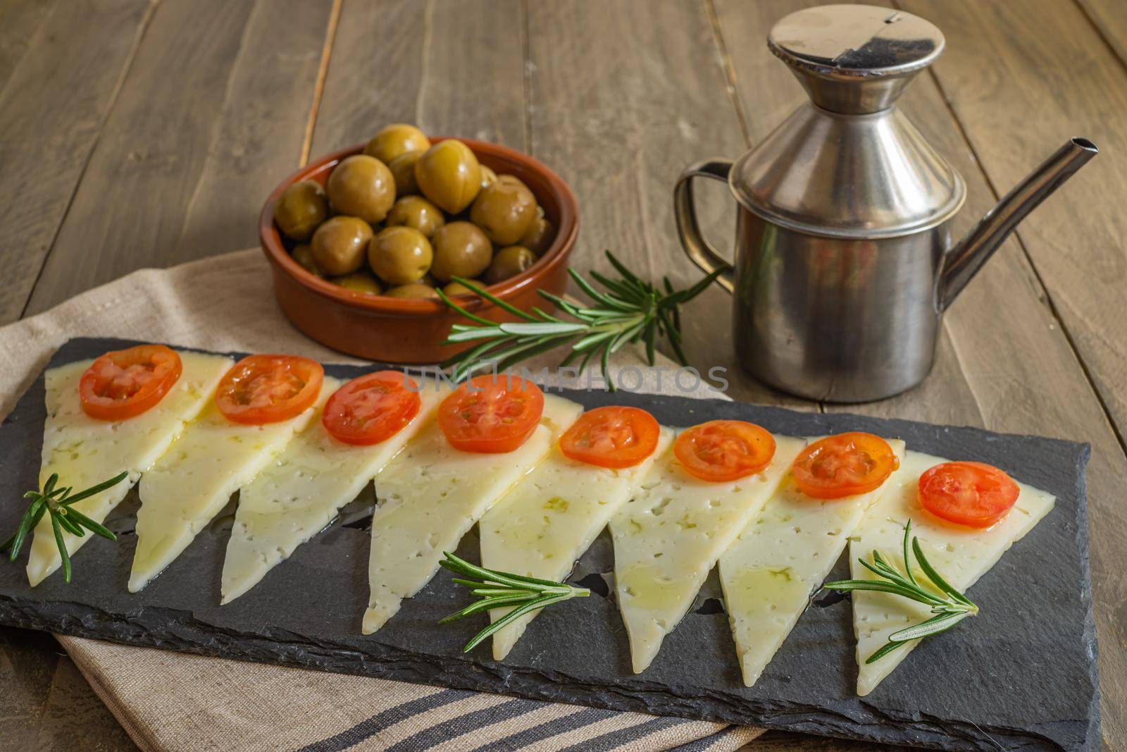 cured cheese and olive oil toast infused with rosemary