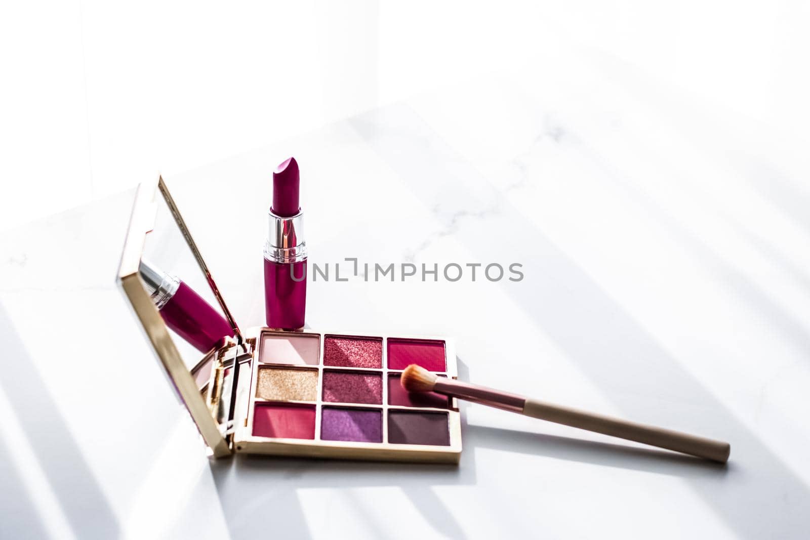 Cosmetic branding, girly and glamour concept - Cosmetics, makeup products set on marble vanity table, lipstick, eyeshadows and make-up brush for luxury beauty and fashion brand ads, holiday design