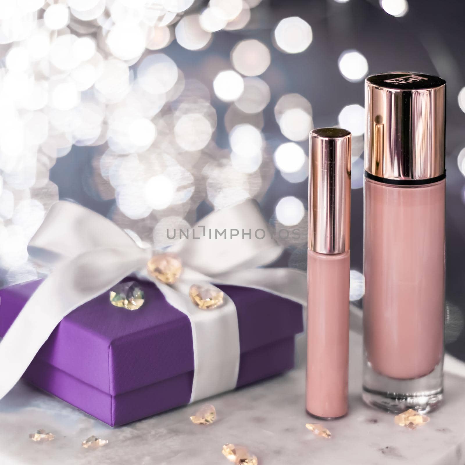 Cosmetic branding, Christmas glitter and girly blog concept - Holiday make-up foundation base, concealer and purple gift box, luxury cosmetics present and blank label products for beauty brand design